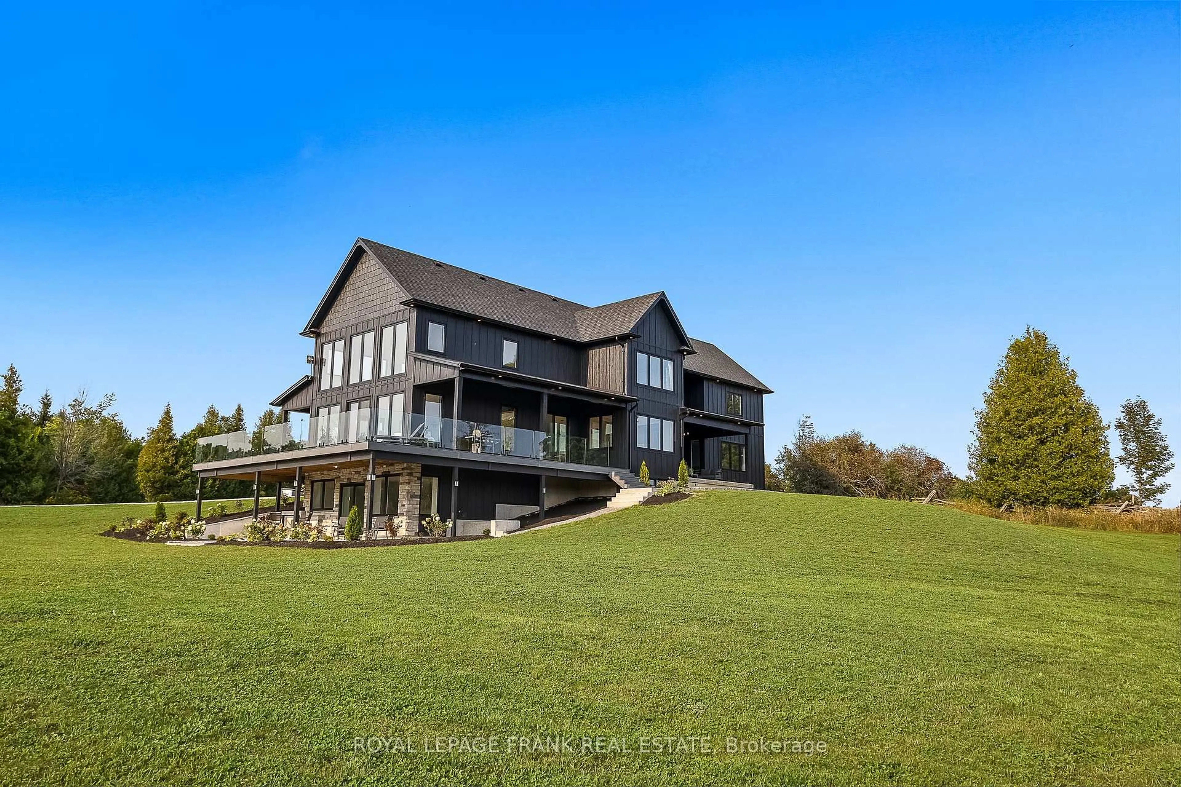 A pic from outside/outdoor area/front of a property/back of a property/a pic from drone, unknown for 27 Morton Line, Cavan Monaghan Ontario L0A 1C0