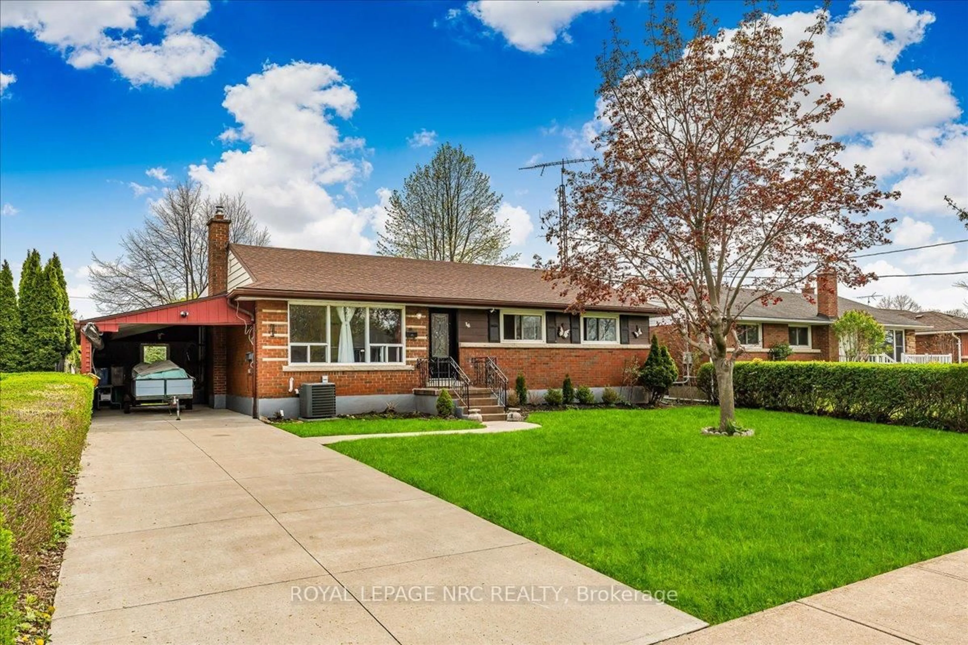 Home with brick exterior material, street for 16 Dunraven Ave, St. Catharines Ontario L2M 6A7