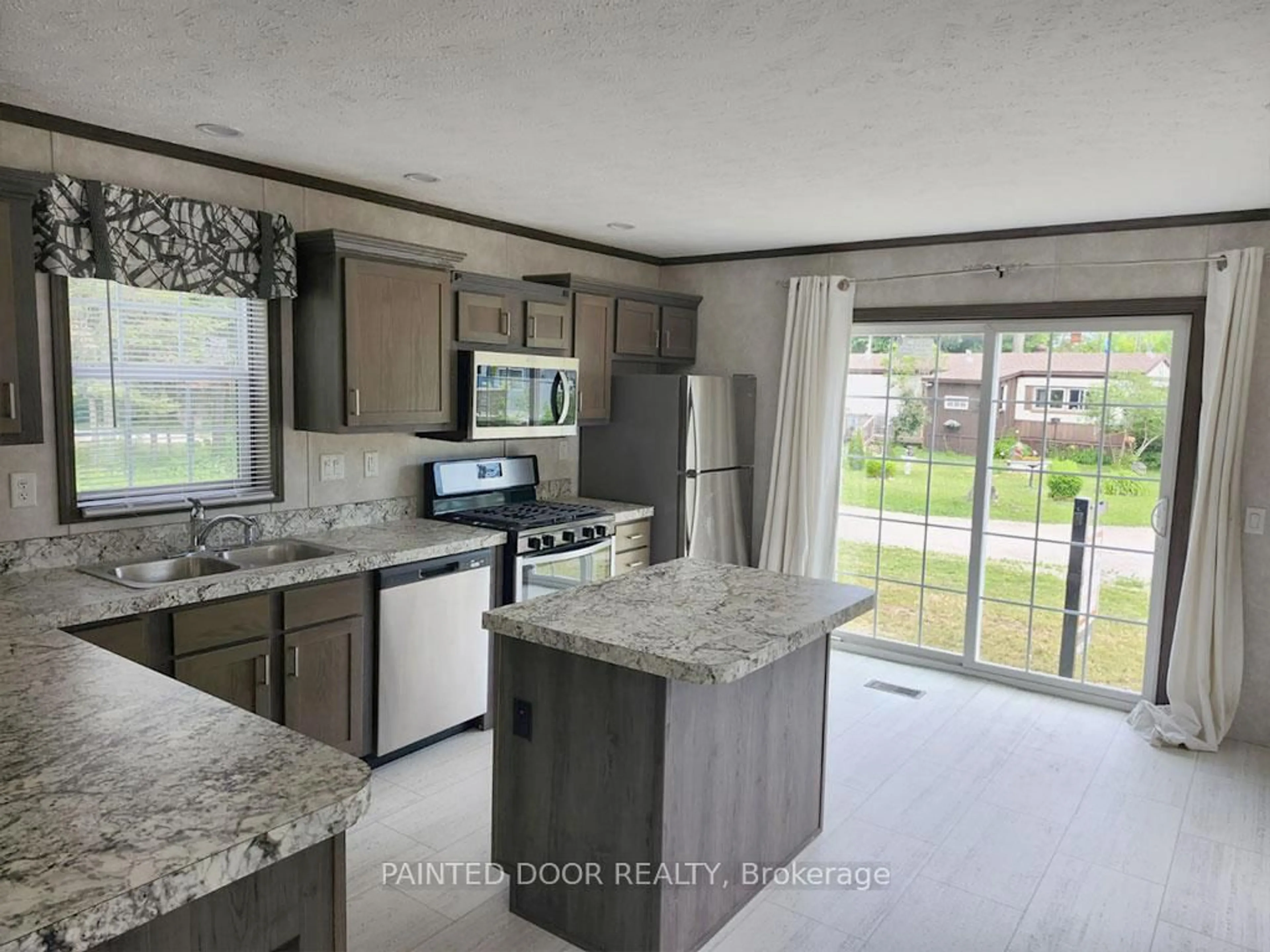 Open concept kitchen, ceramic/tile floor for 45 Tower Rd #4, Georgian Bay Ontario P0C 1H0