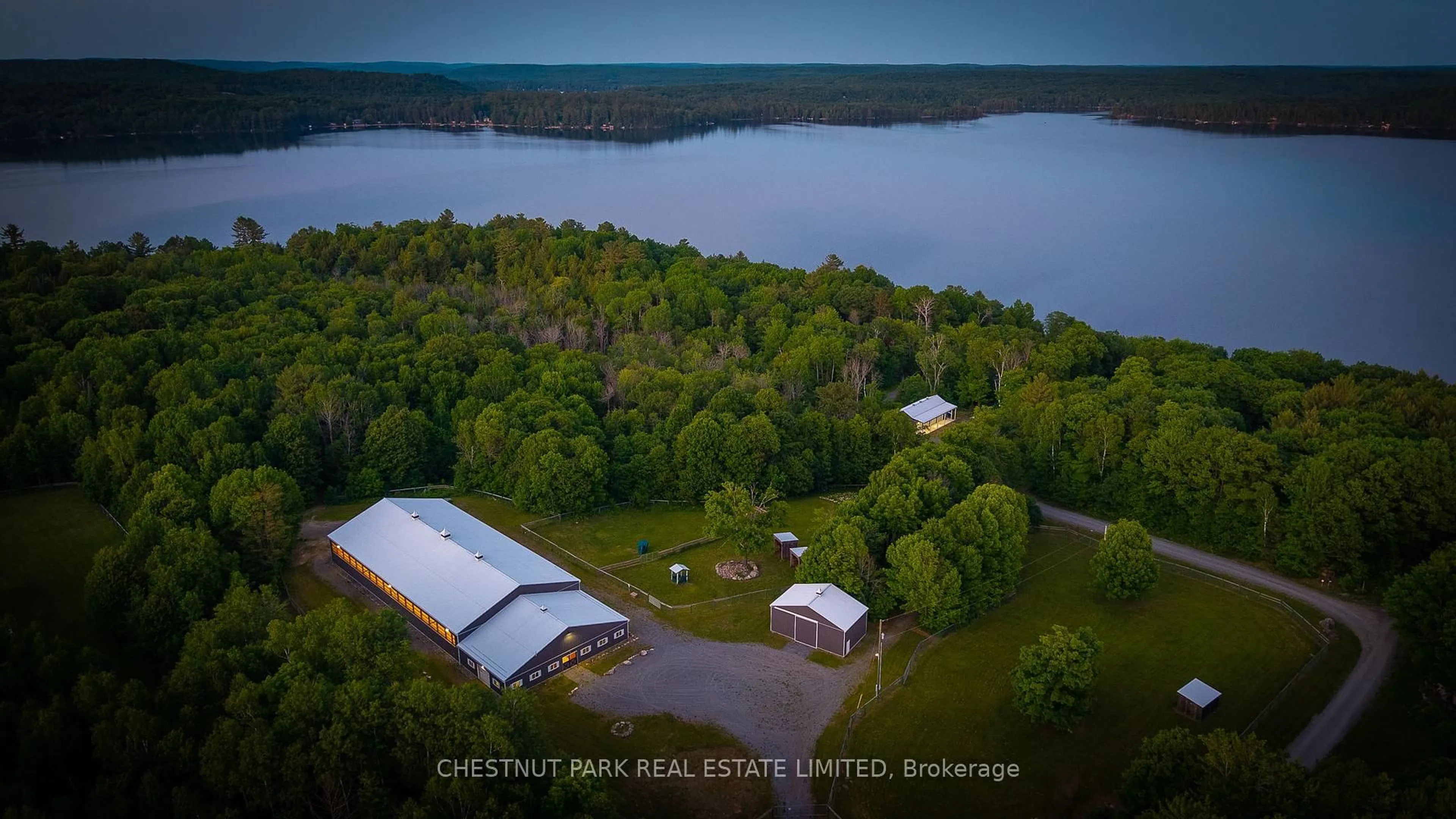 A pic from outside/outdoor area/front of a property/back of a property/a pic from drone, water/lake/river/ocean view for 1141 Nu-Ne Lane, Algonquin Highlands Ontario K0M 1S0
