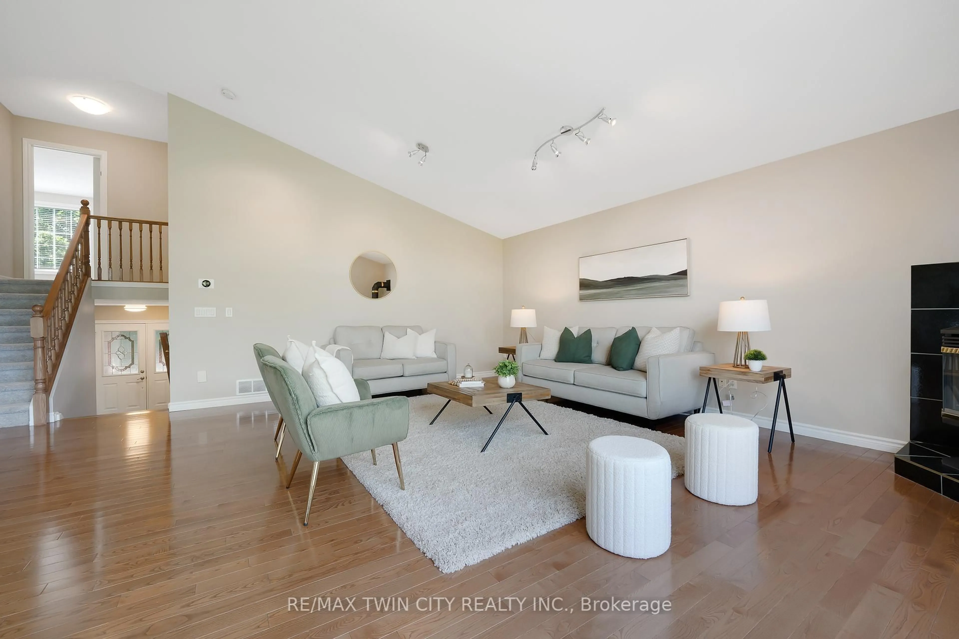 Living room with furniture, wood/laminate floor for 3 Firella Pl, Wellesley Ontario N0B 2T0