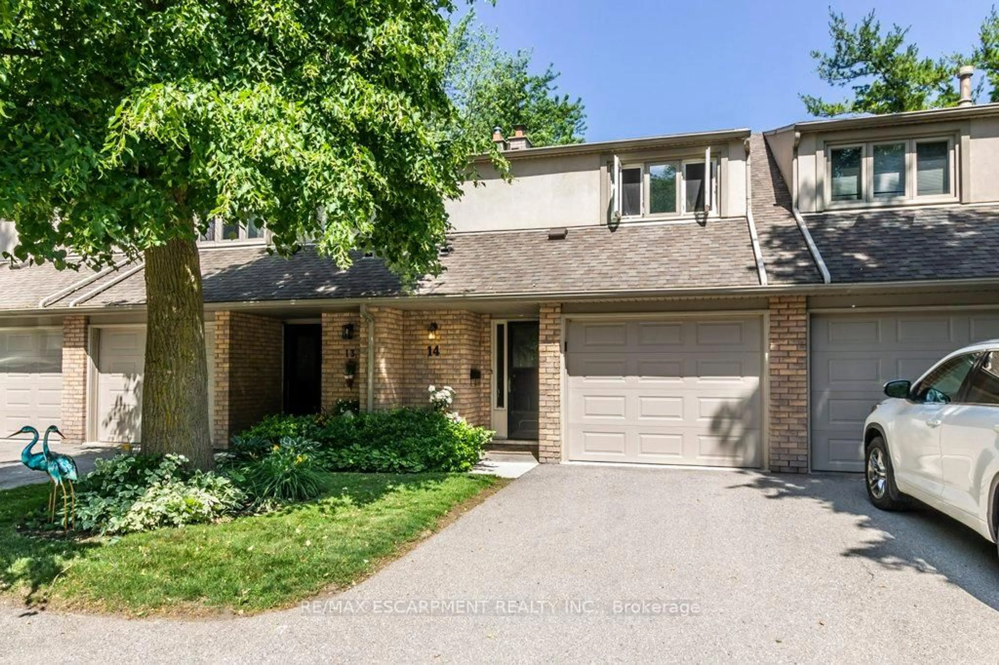Home with brick exterior material, street for 109 Wilson St #14, Hamilton Ontario L9G 1N4