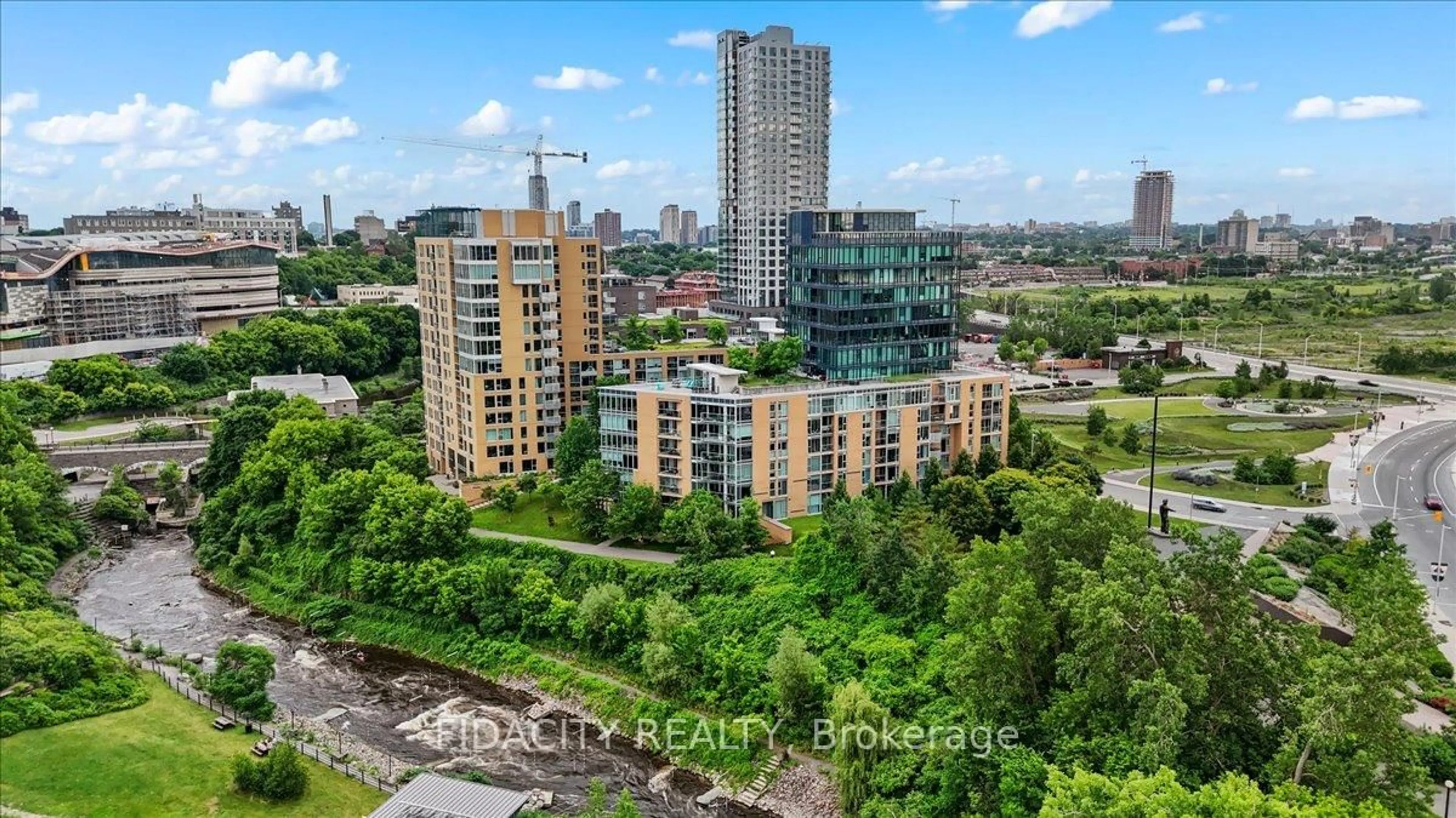A pic from outside/outdoor area/front of a property/back of a property/a pic from drone, city buildings view from balcony for 200 Lett St #701, Ottawa Ontario K1R 0A7