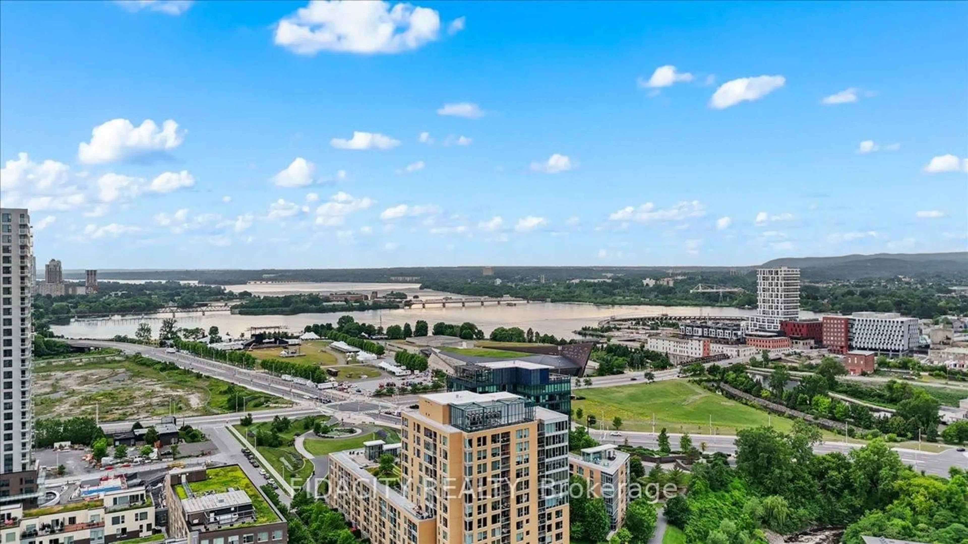 A pic from outside/outdoor area/front of a property/back of a property/a pic from drone, water/lake/river/ocean view for 200 Lett St #701, Ottawa Ontario K1R 0A7