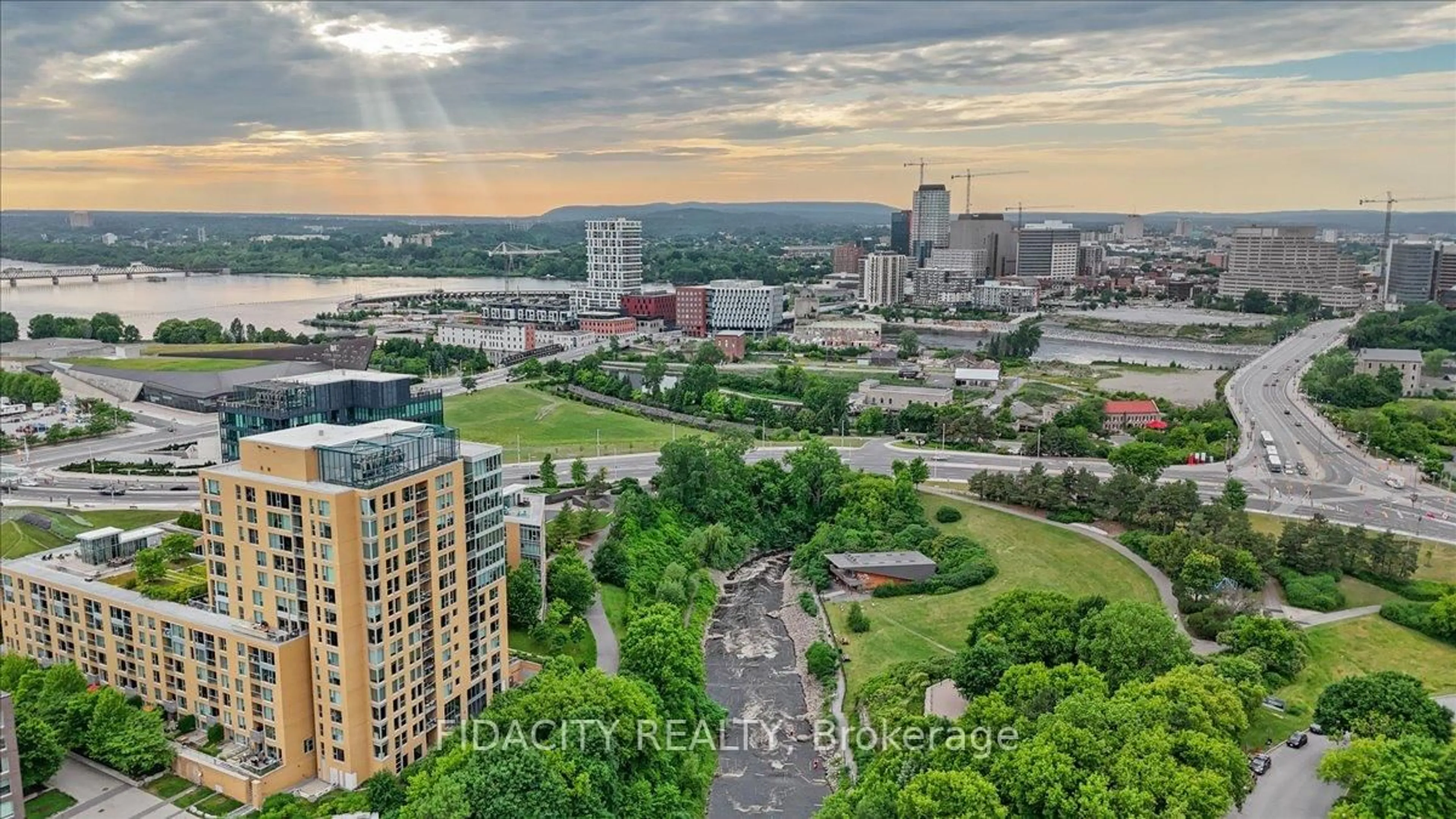 A pic from outside/outdoor area/front of a property/back of a property/a pic from drone, city buildings view from balcony for 200 Lett St #701, Ottawa Ontario K1R 0A7