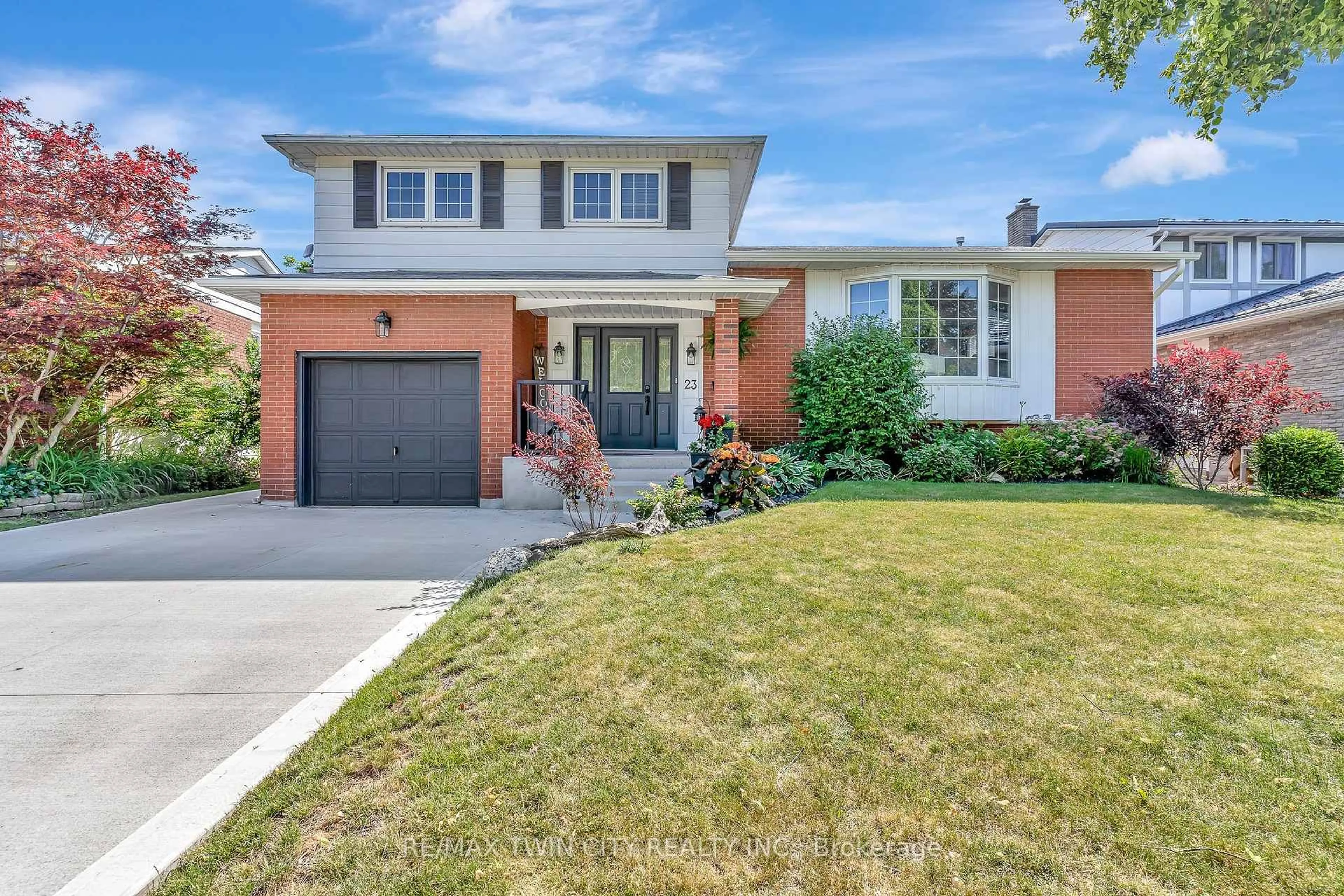 Home with brick exterior material, street for 23 Meadowbrooke Dr, Kitchener Ontario N2N 1E5