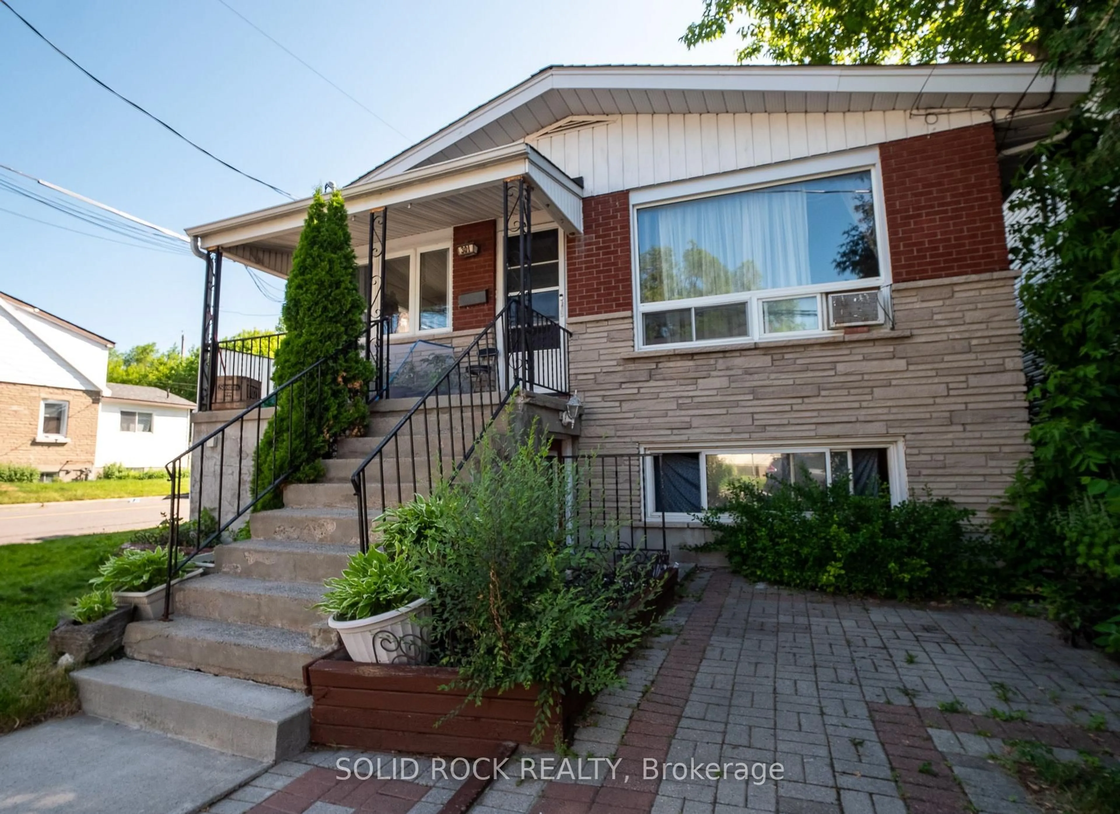 Home with brick exterior material, street for 310 Patton St, Ottawa Ontario K1L 6G4