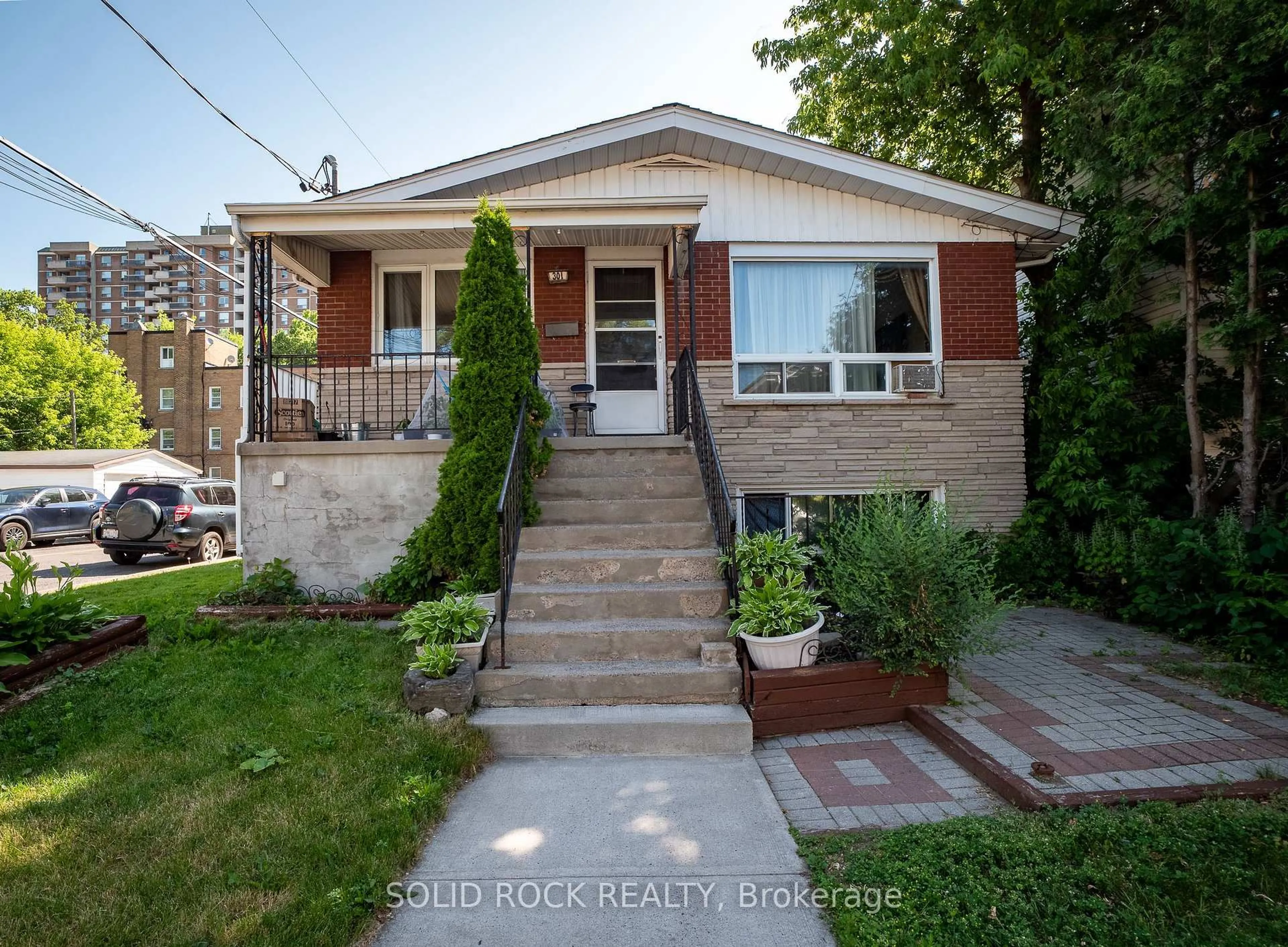 Home with brick exterior material, street for 310 Patton St, Ottawa Ontario K1L 6G4