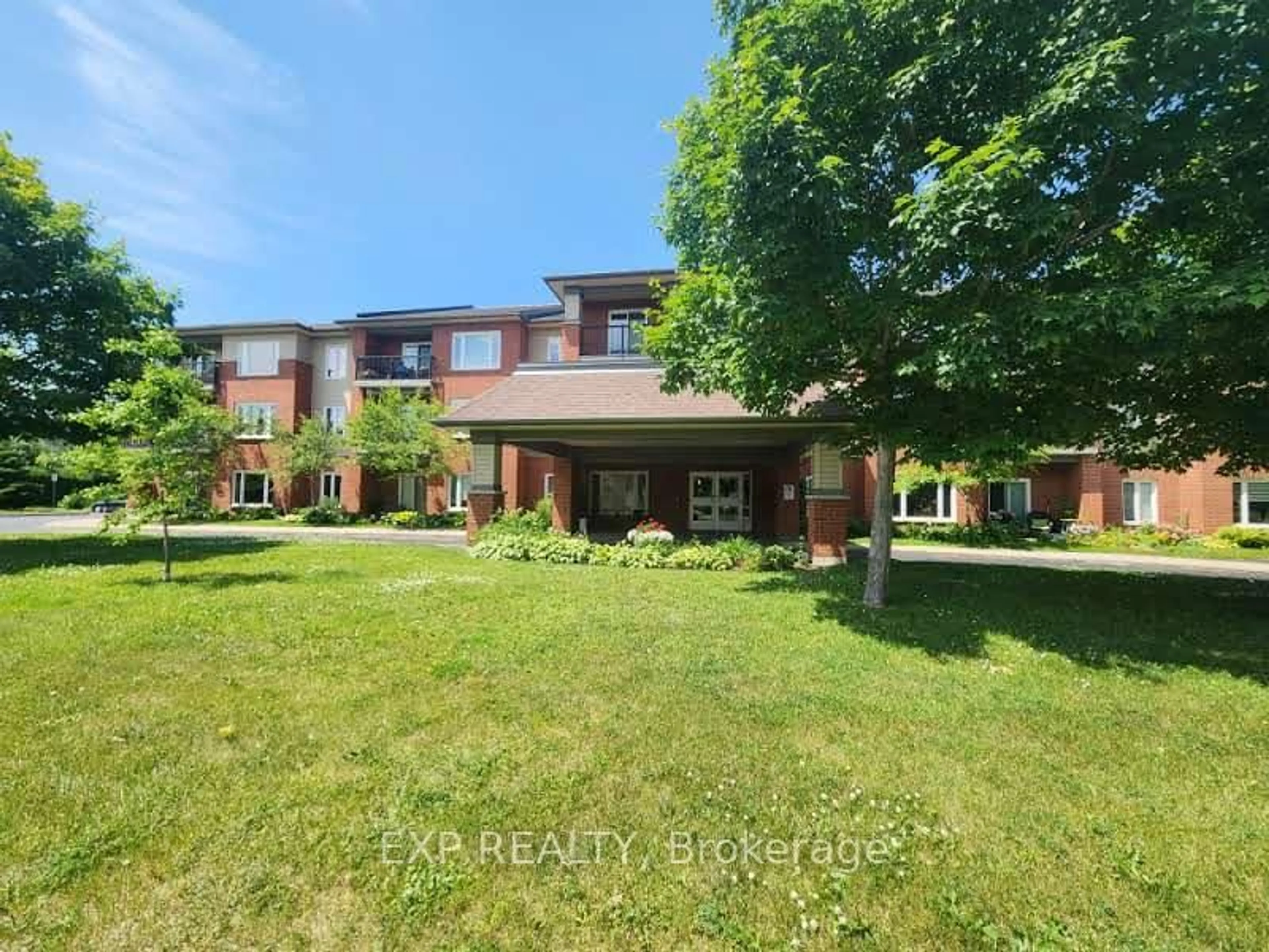 A pic from outside/outdoor area/front of a property/back of a property/a pic from drone, unknown for 100 Jamieson Cres #103, Almonte Ontario K0A 1A0