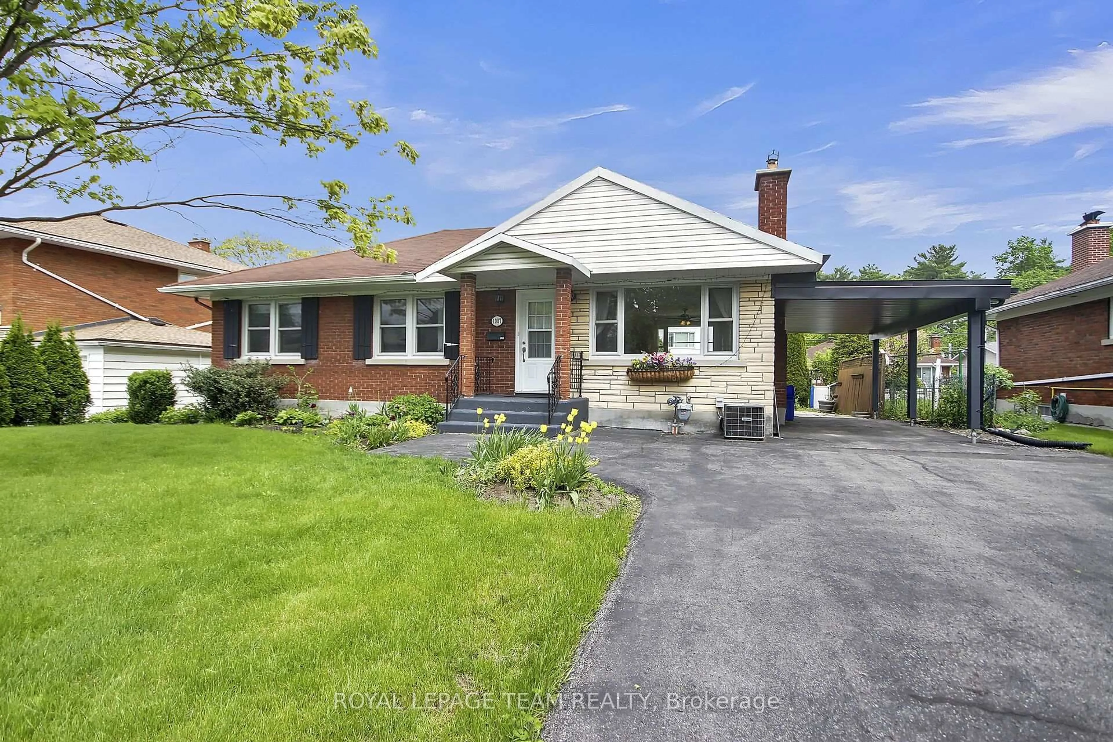 Home with brick exterior material, street for 1007 Bakervale Dr, Ottawa Ontario K1Z 6N7