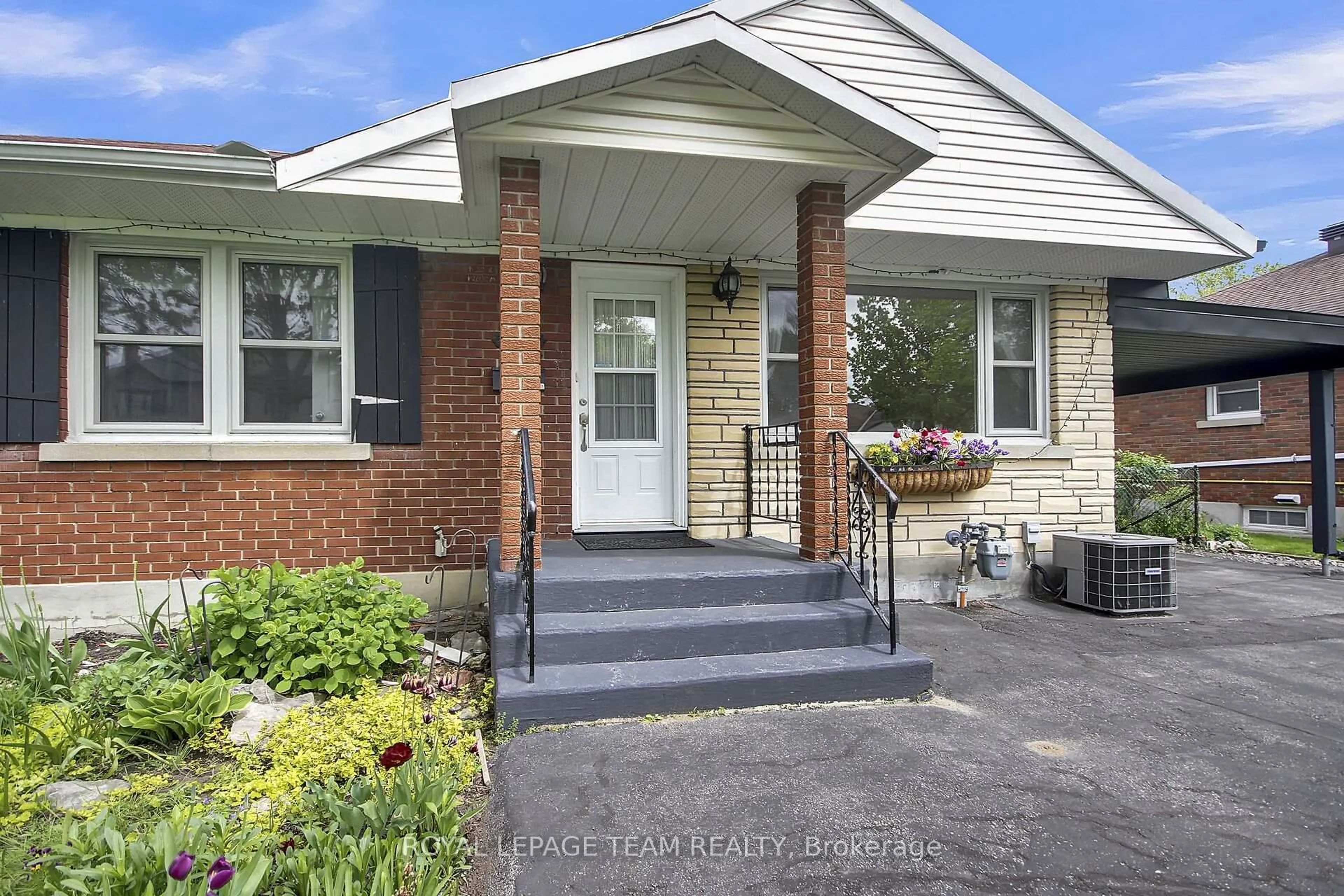 Home with brick exterior material, street for 1007 Bakervale Dr, Ottawa Ontario K1Z 6N7
