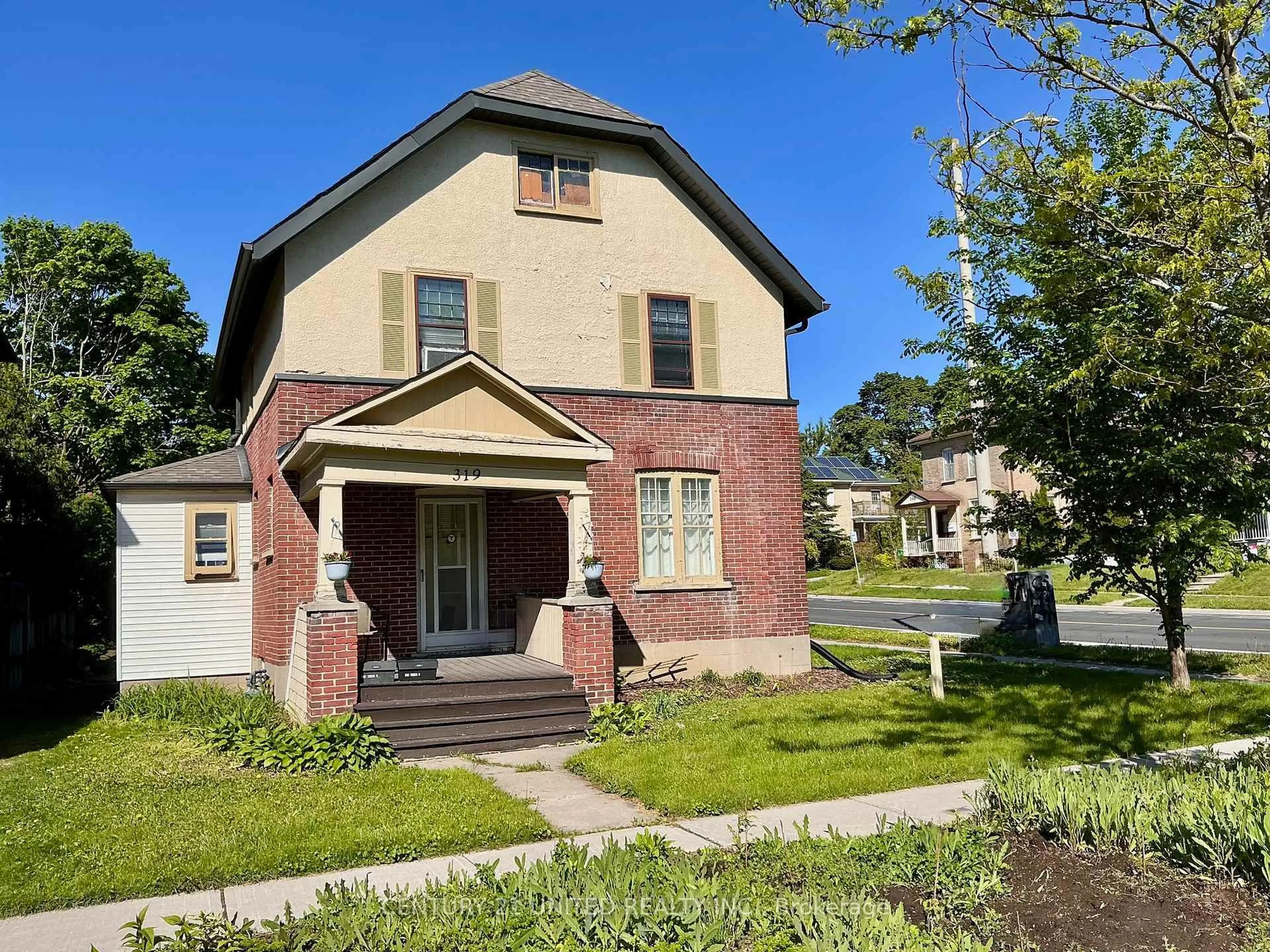 Home with brick exterior material, street for 319 Elias Ave, Peterborough Central Ontario K9J 5G8