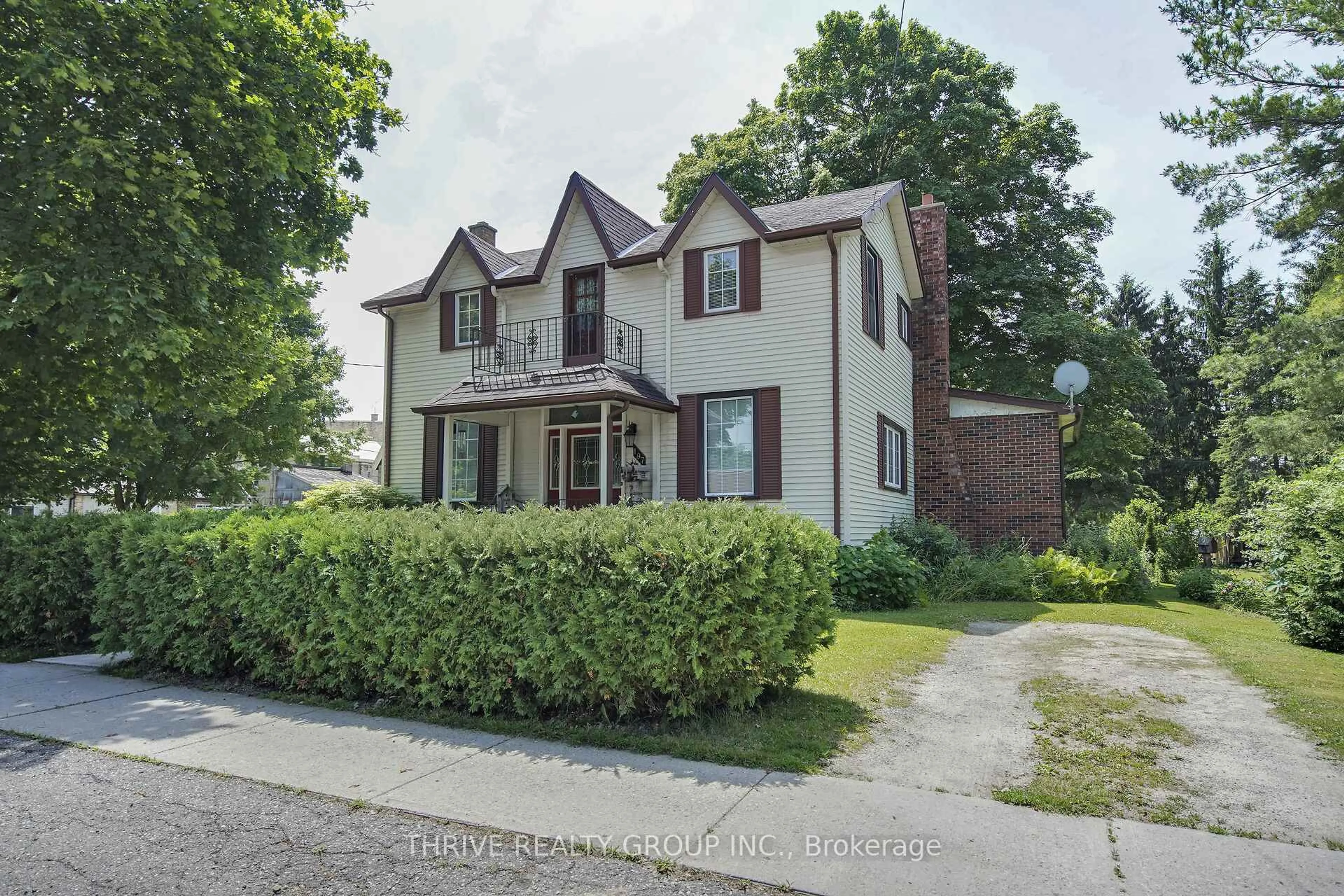 A pic from outside/outdoor area/front of a property/back of a property/a pic from drone, street for 197 Broad St, North Middlesex Ontario N0M 2K0