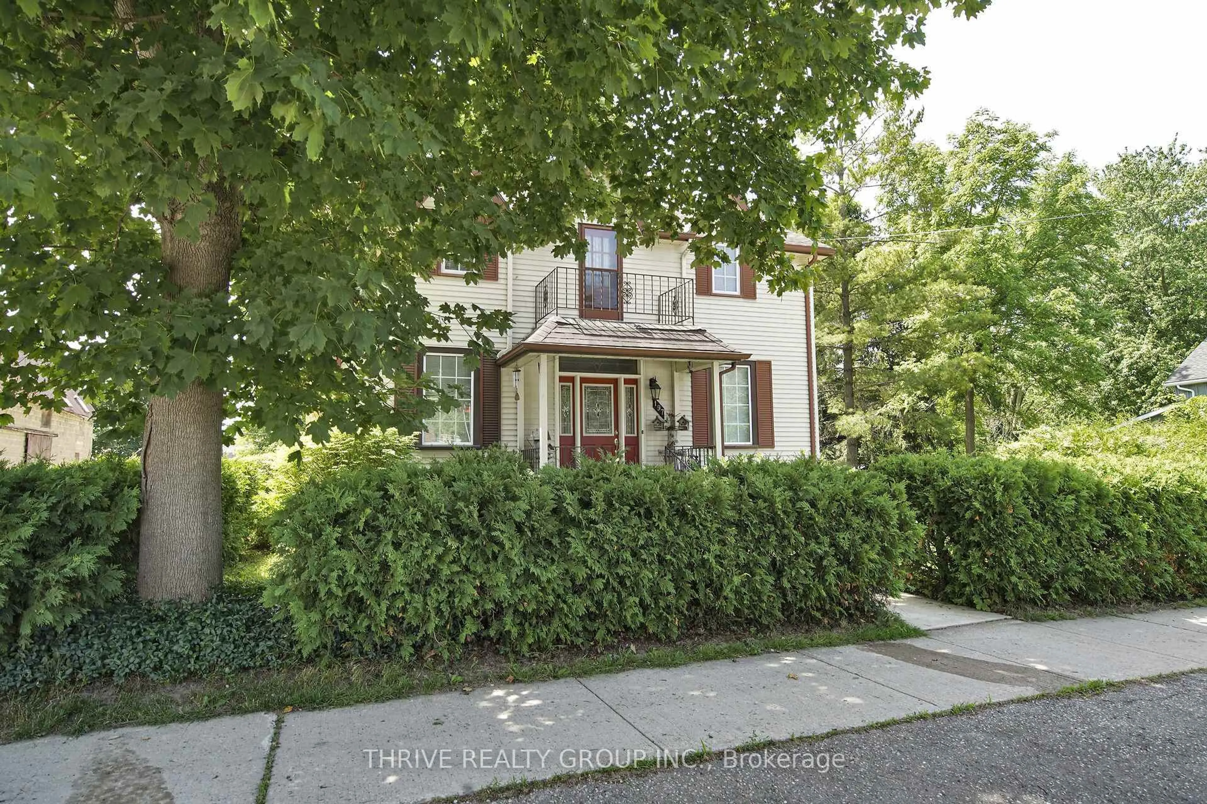 Home with brick exterior material, street for 197 Broad St, North Middlesex Ontario N0M 2K0
