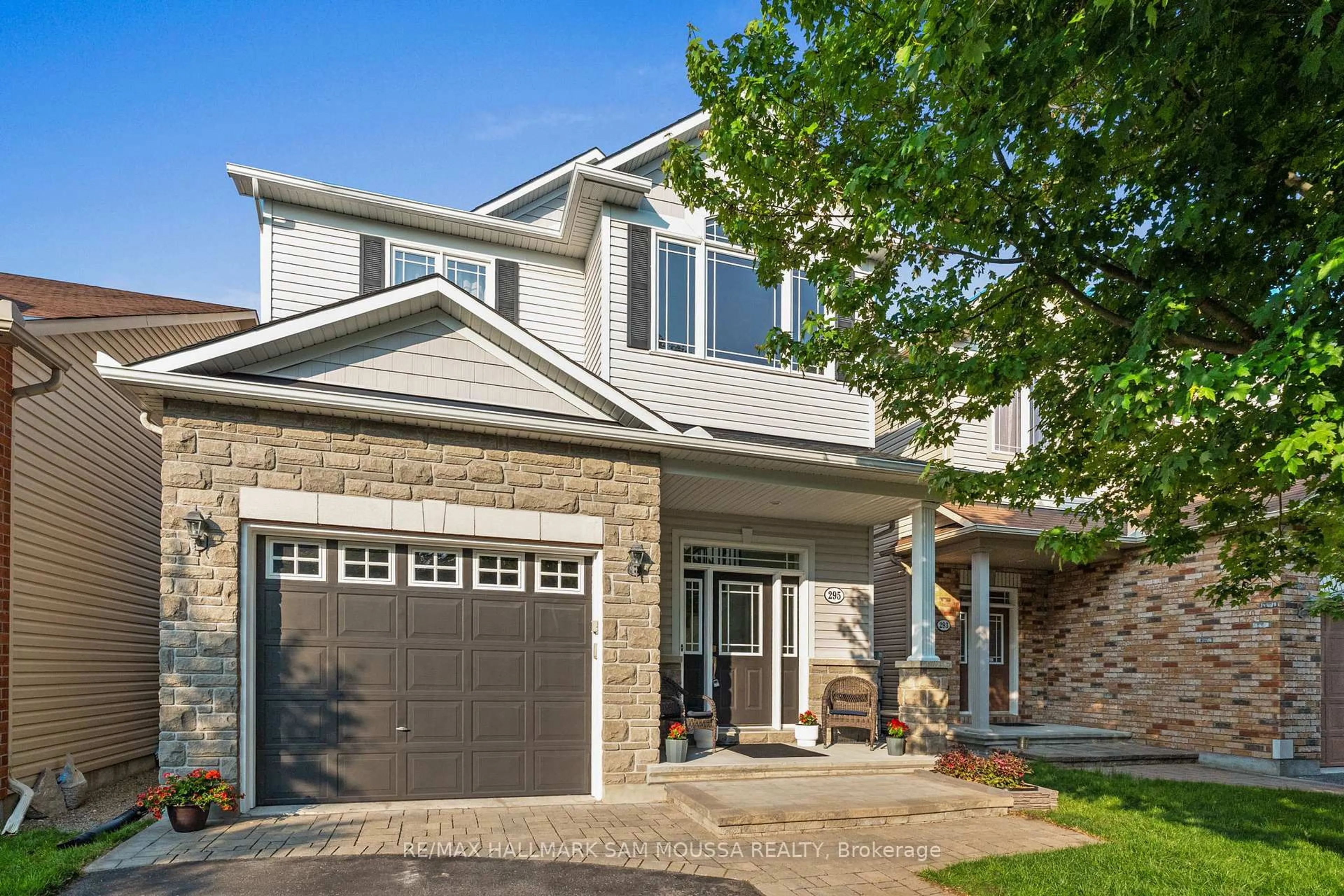 Home with brick exterior material, street for 295 Harthill Way, Ottawa Ontario K2J 0P3
