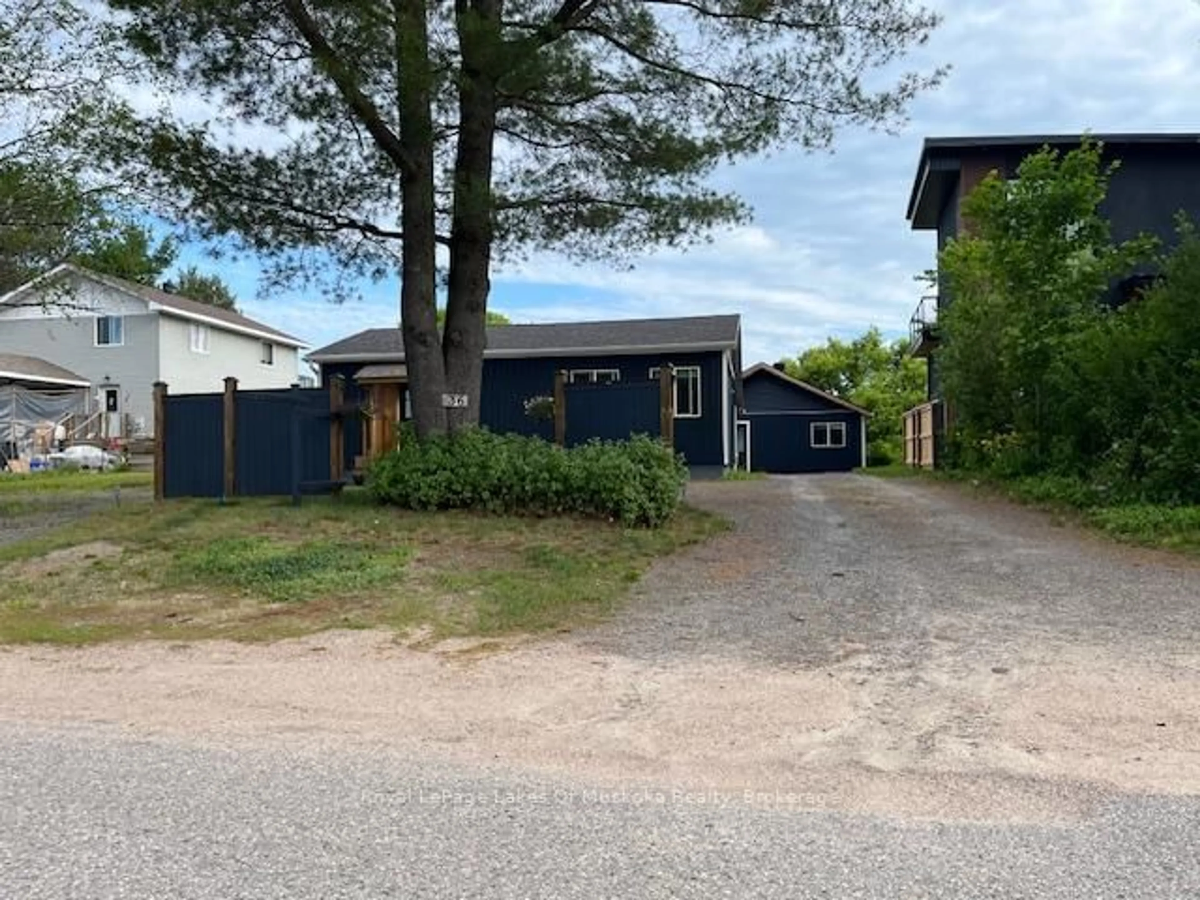 A pic from outside/outdoor area/front of a property/back of a property/a pic from drone, street for 36 Ottawa Ave, South River Ontario P0A 1X0