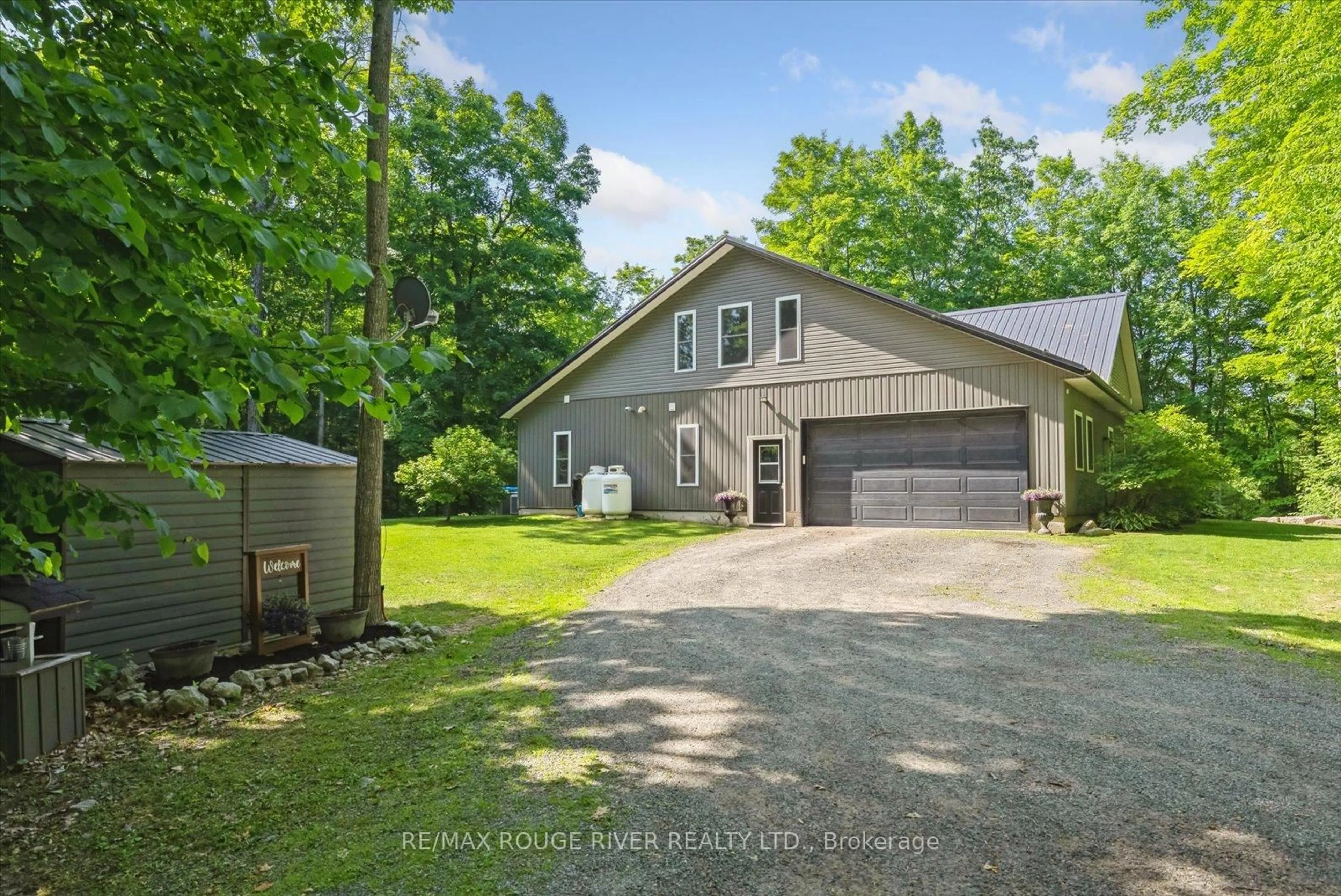 A pic from outside/outdoor area/front of a property/back of a property/a pic from drone, unknown for 36 Station Rd, Limoges Ontario K0K 2M0