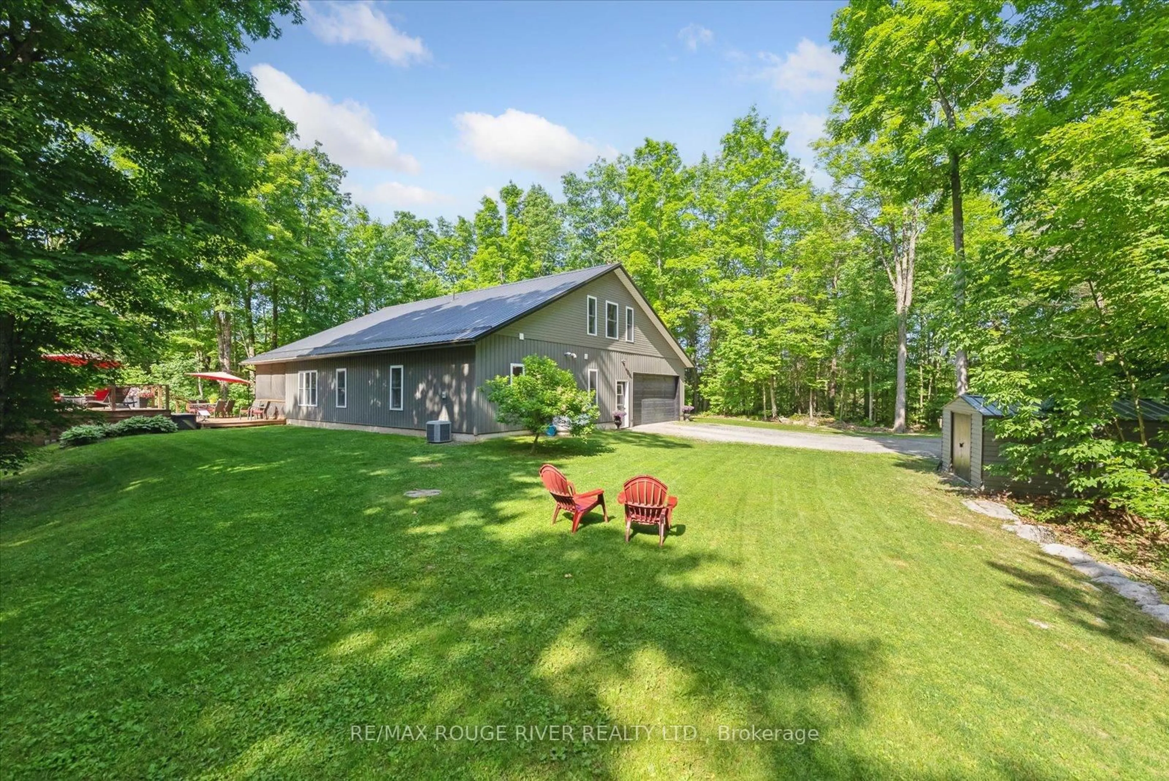A pic from outside/outdoor area/front of a property/back of a property/a pic from drone, water/lake/river/ocean view for 36 Station Rd, Limoges Ontario K0K 2M0