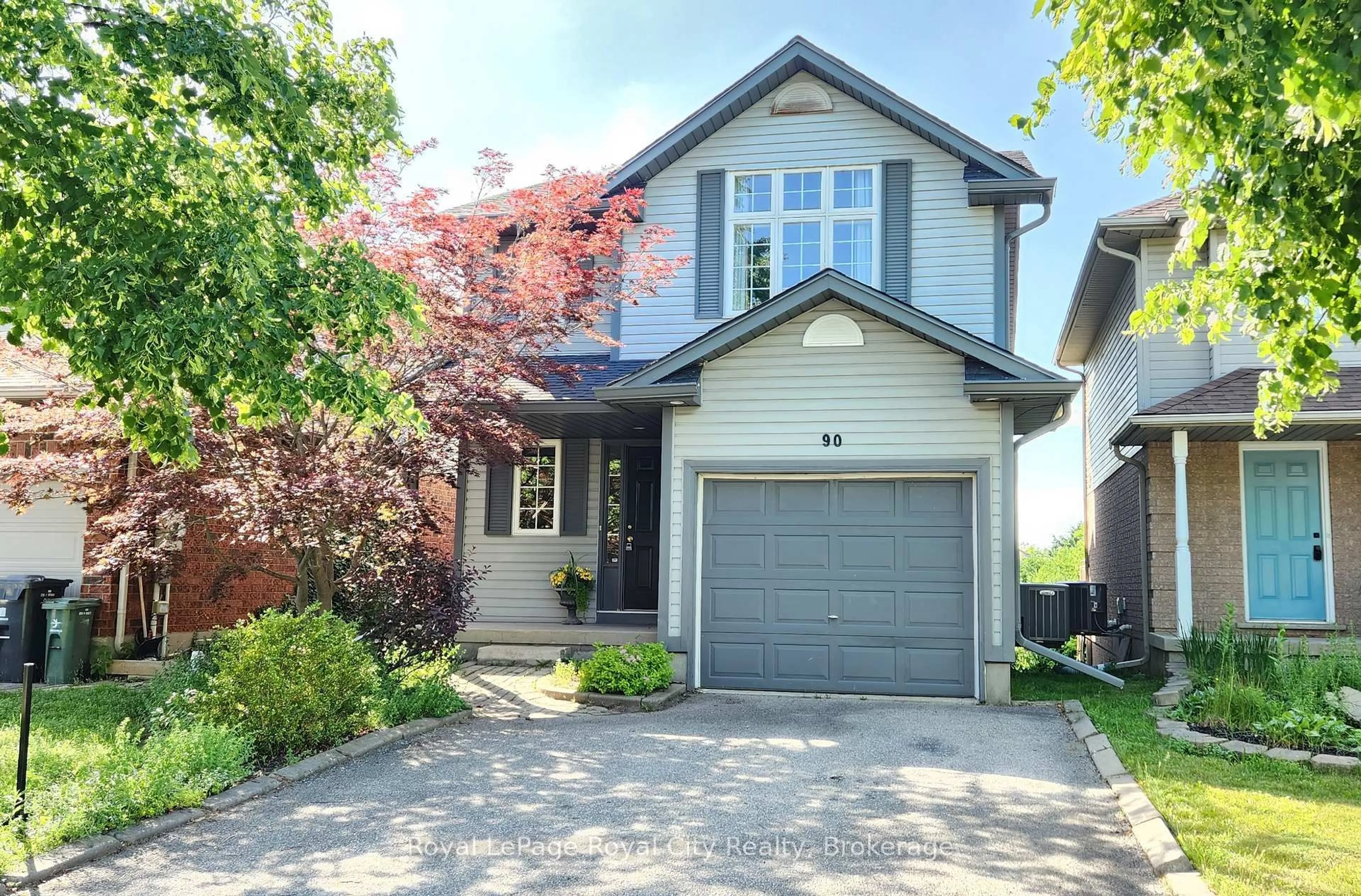 Home with brick exterior material, street for 90 Doyle Dr, Guelph Ontario N1G 5B9