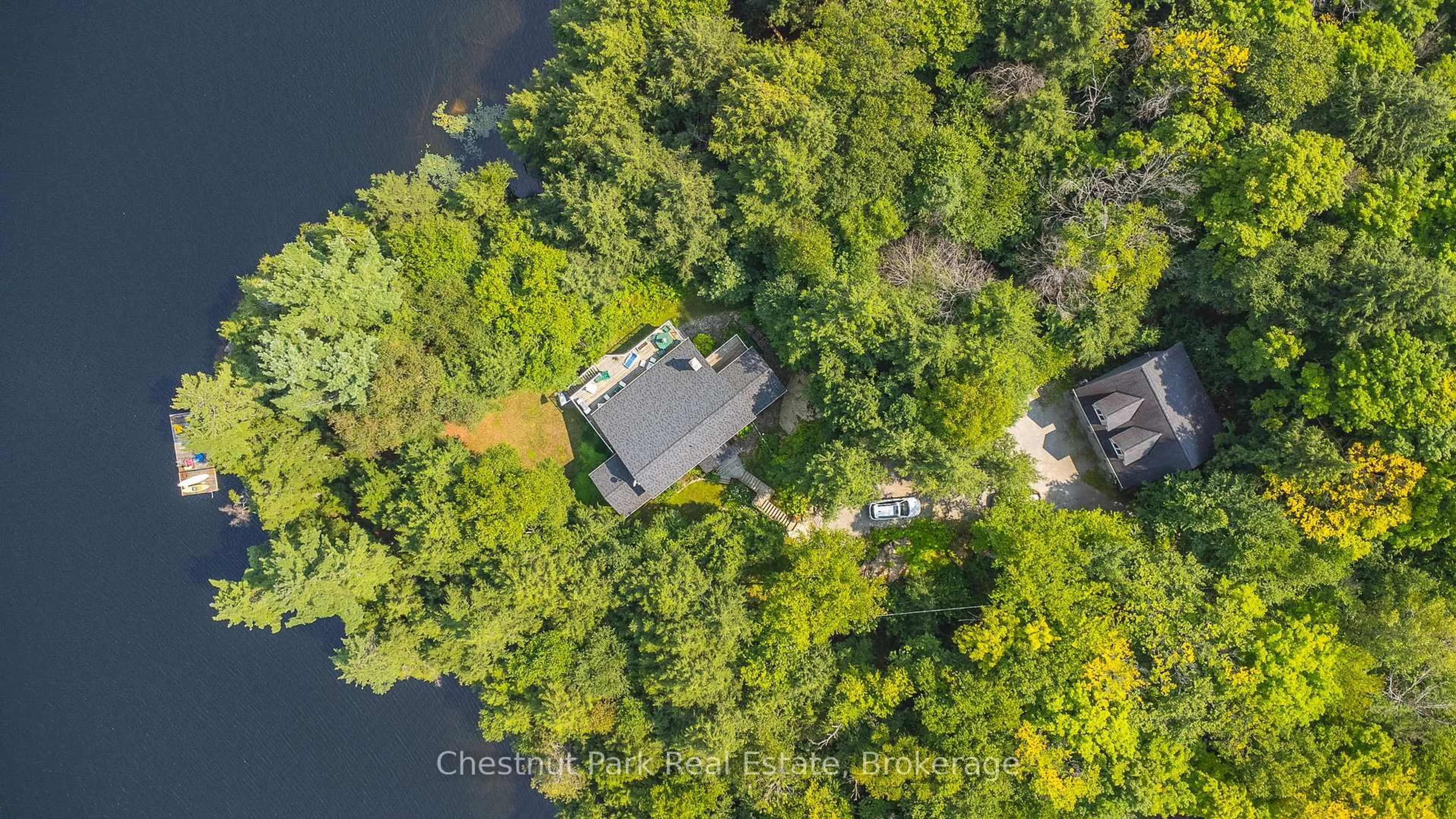 A pic from outside/outdoor area/front of a property/back of a property/a pic from drone, water/lake/river/ocean view for 1003 Arnott Lane, Dysart et al Ontario K0M 1S0