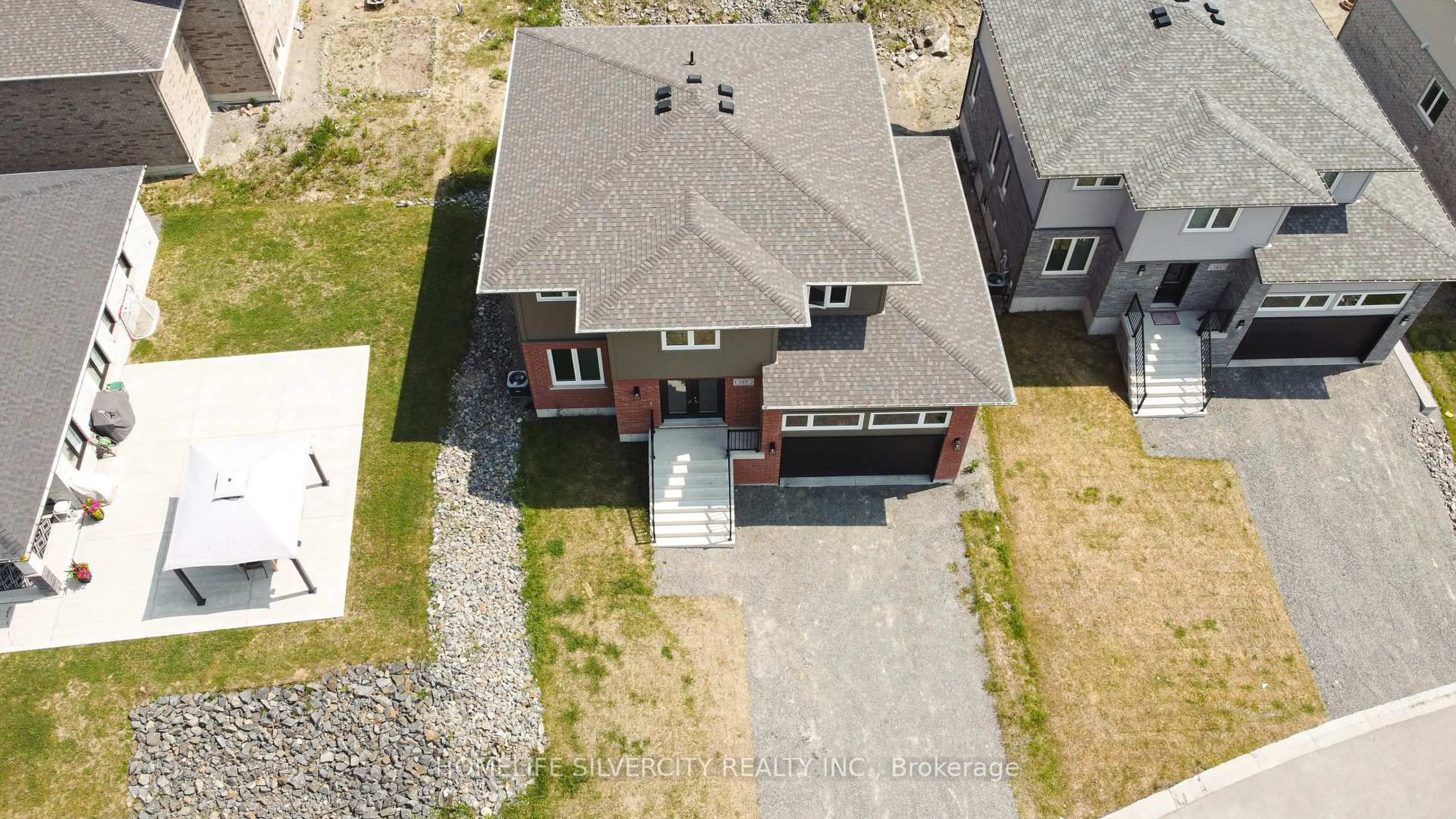 A pic from outside/outdoor area/front of a property/back of a property/a pic from drone, street for 137 Landreville Dr, Sudbury Remote Area Ontario P3A 0B5