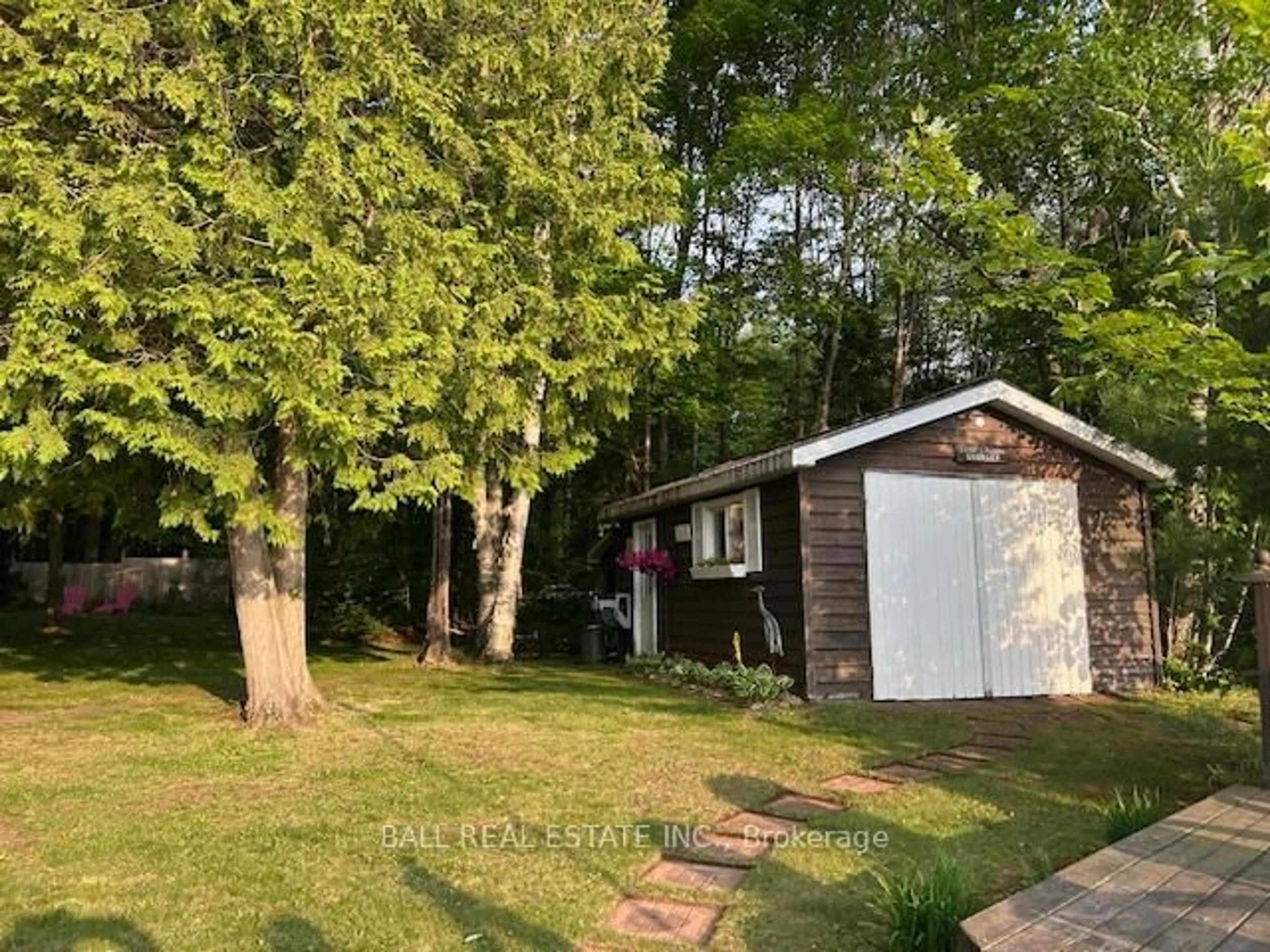 A pic from outside/outdoor area/front of a property/back of a property/a pic from drone, forest/trees view for 1117 Graham's Lane, Algonquin Highlands Ontario K0M 1J2