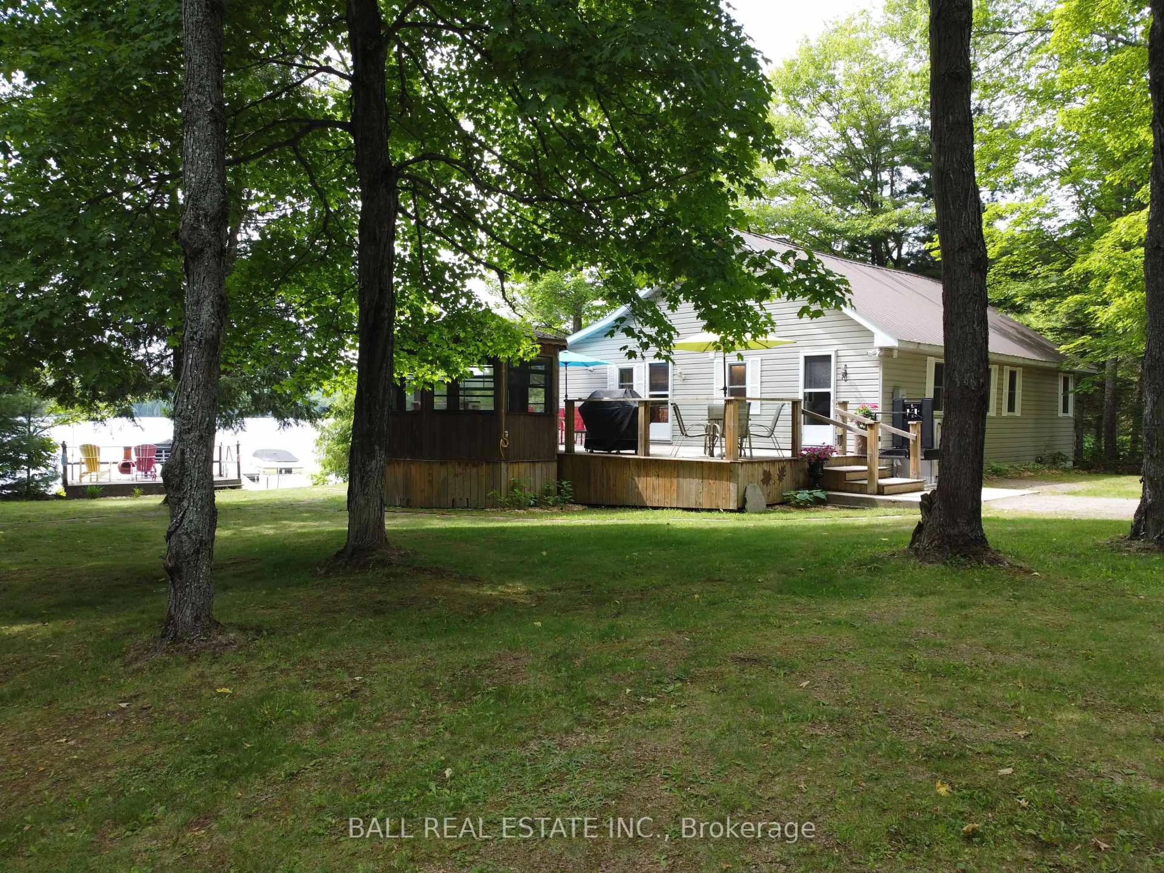 A pic from outside/outdoor area/front of a property/back of a property/a pic from drone, water/lake/river/ocean view for 1117 Graham's Lane, Algonquin Highlands Ontario K0M 1J2