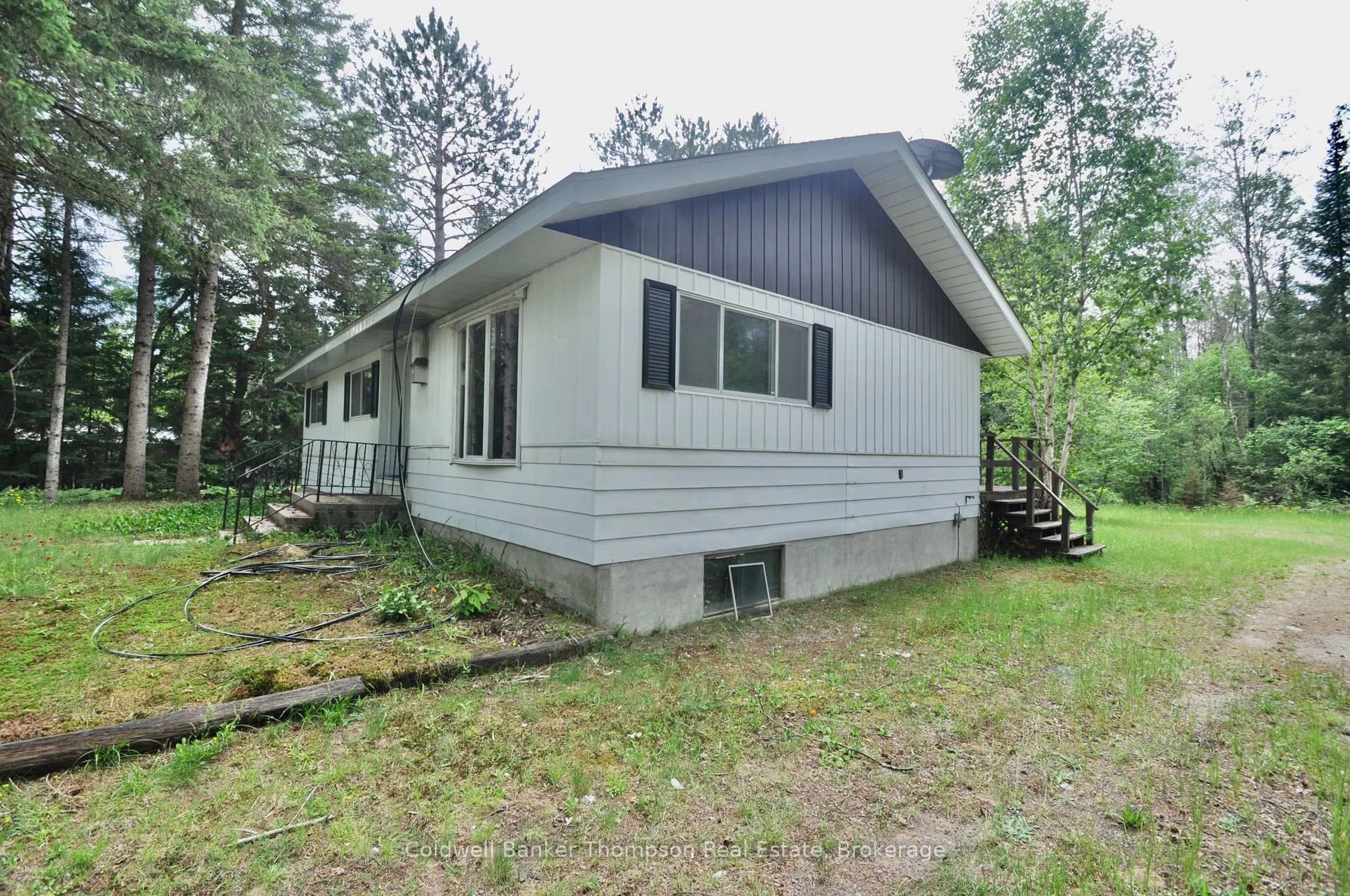 Home with vinyl exterior material, building for 8 Spruce Lane, Armour Ontario P0A 1L0