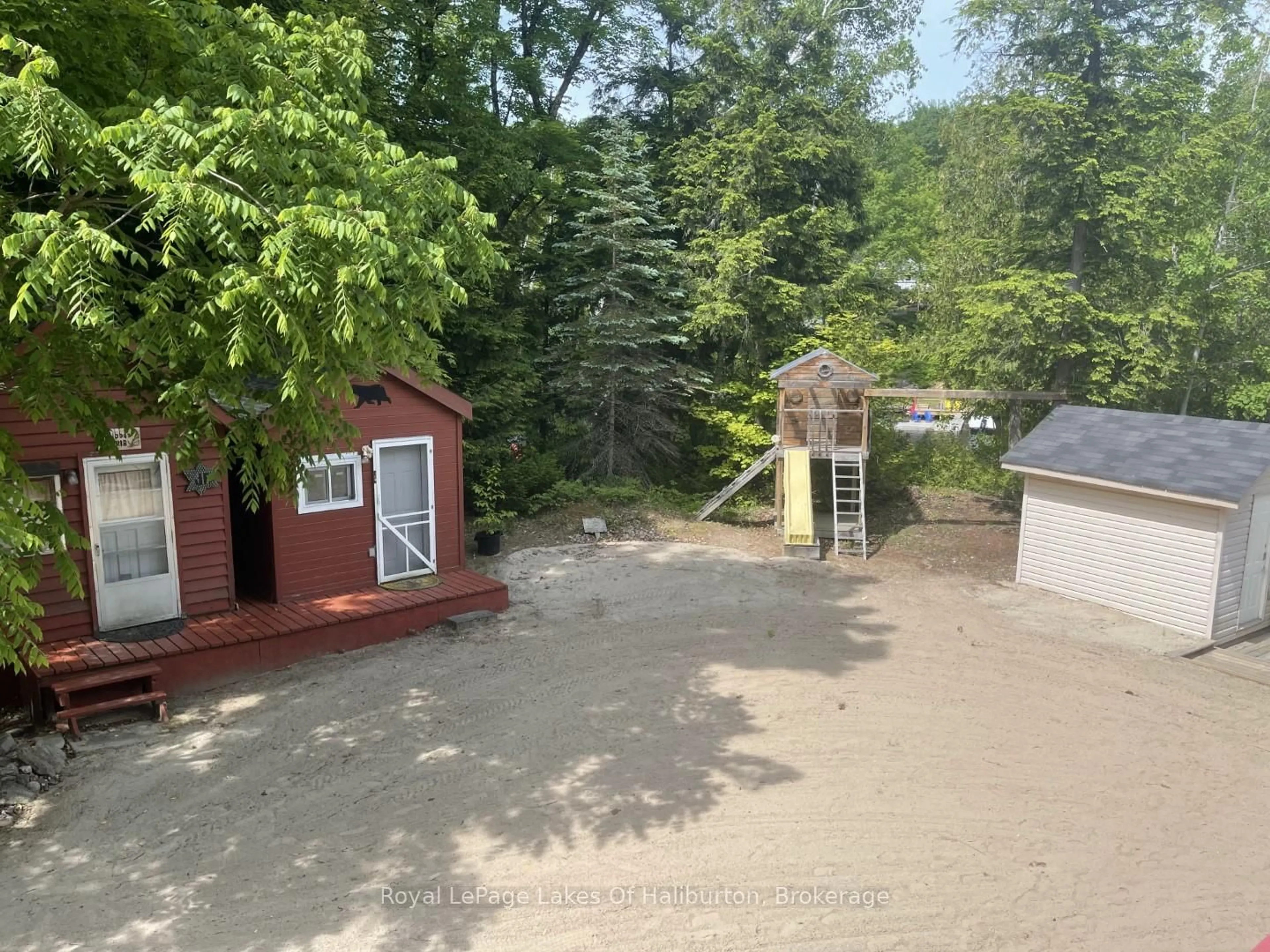 A pic from outside/outdoor area/front of a property/back of a property/a pic from drone, unknown for 1701 Claude Brown Rd, Minden Hills Ontario K0M 2K0