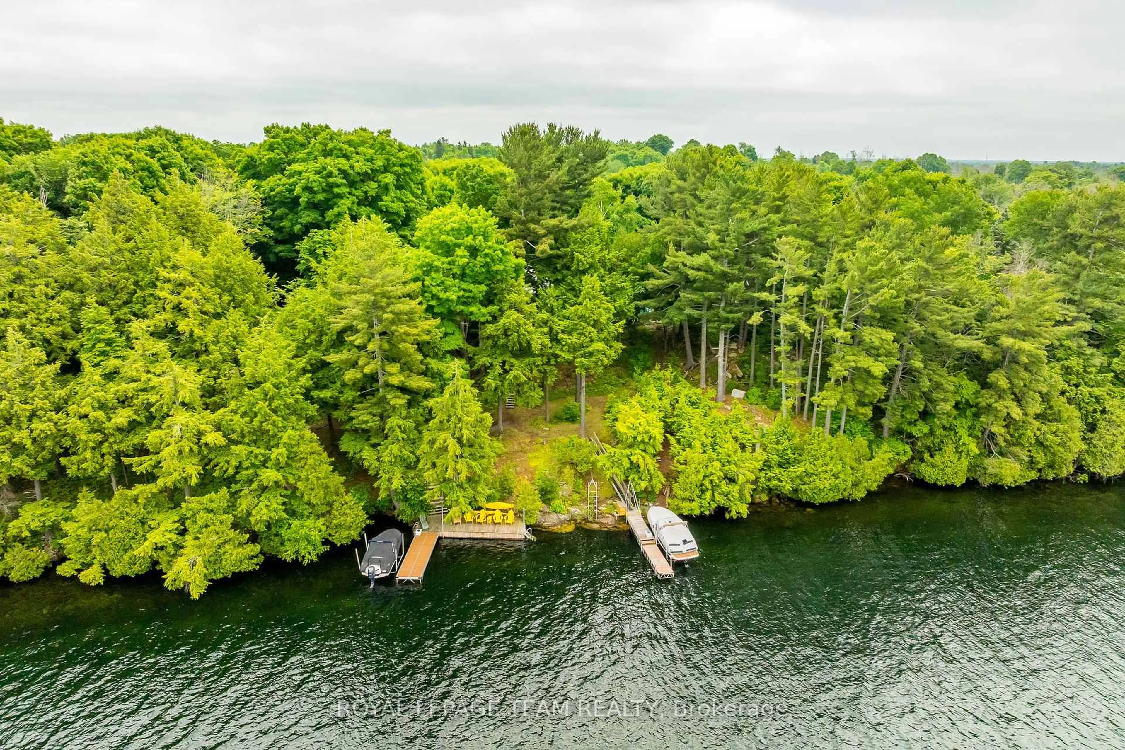 A pic from outside/outdoor area/front of a property/back of a property/a pic from drone, water/lake/river/ocean view for 42 Penny Lane, Rideau Lakes Ontario K0G 1V0