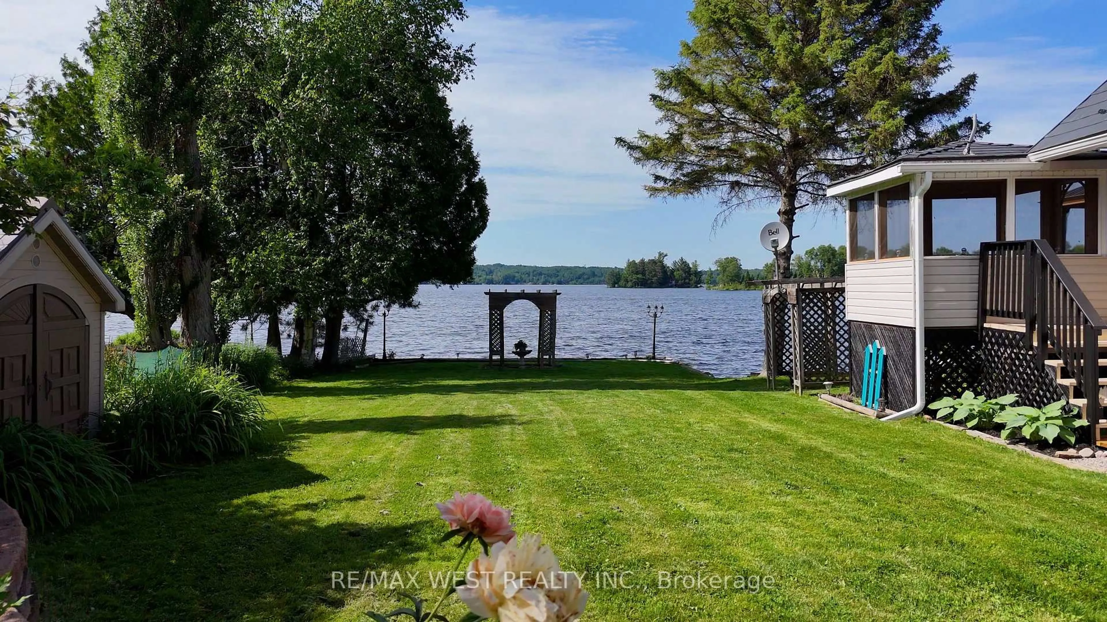 A pic from outside/outdoor area/front of a property/back of a property/a pic from drone, water/lake/river/ocean view for 38 Turgeon Lane, East Ferris Ontario P0H 1B0