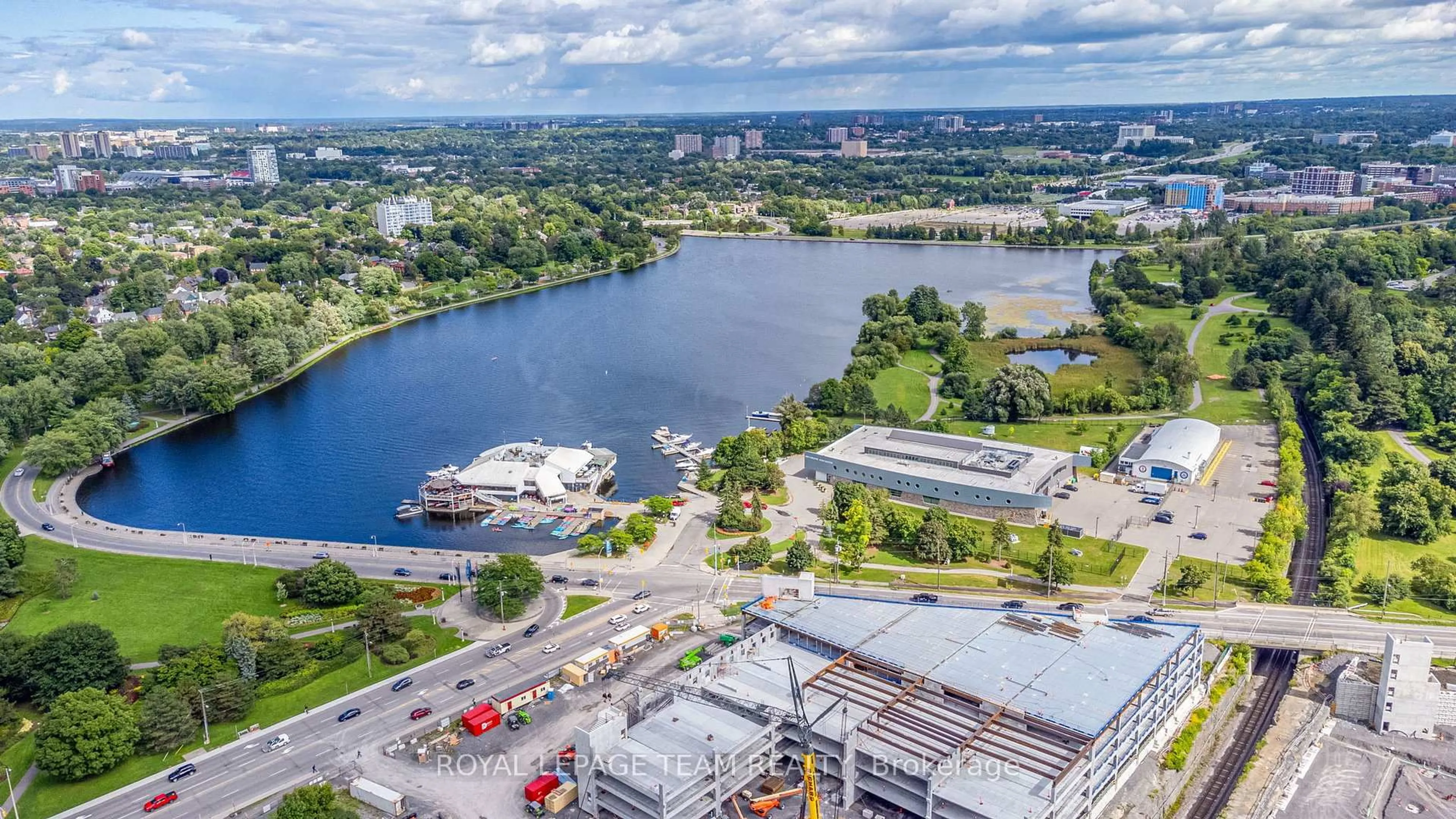 A pic from outside/outdoor area/front of a property/back of a property/a pic from drone, water/lake/river/ocean view for 241 Breezehill Ave #B/B2, Ottawa Ontario K1Y 2J2