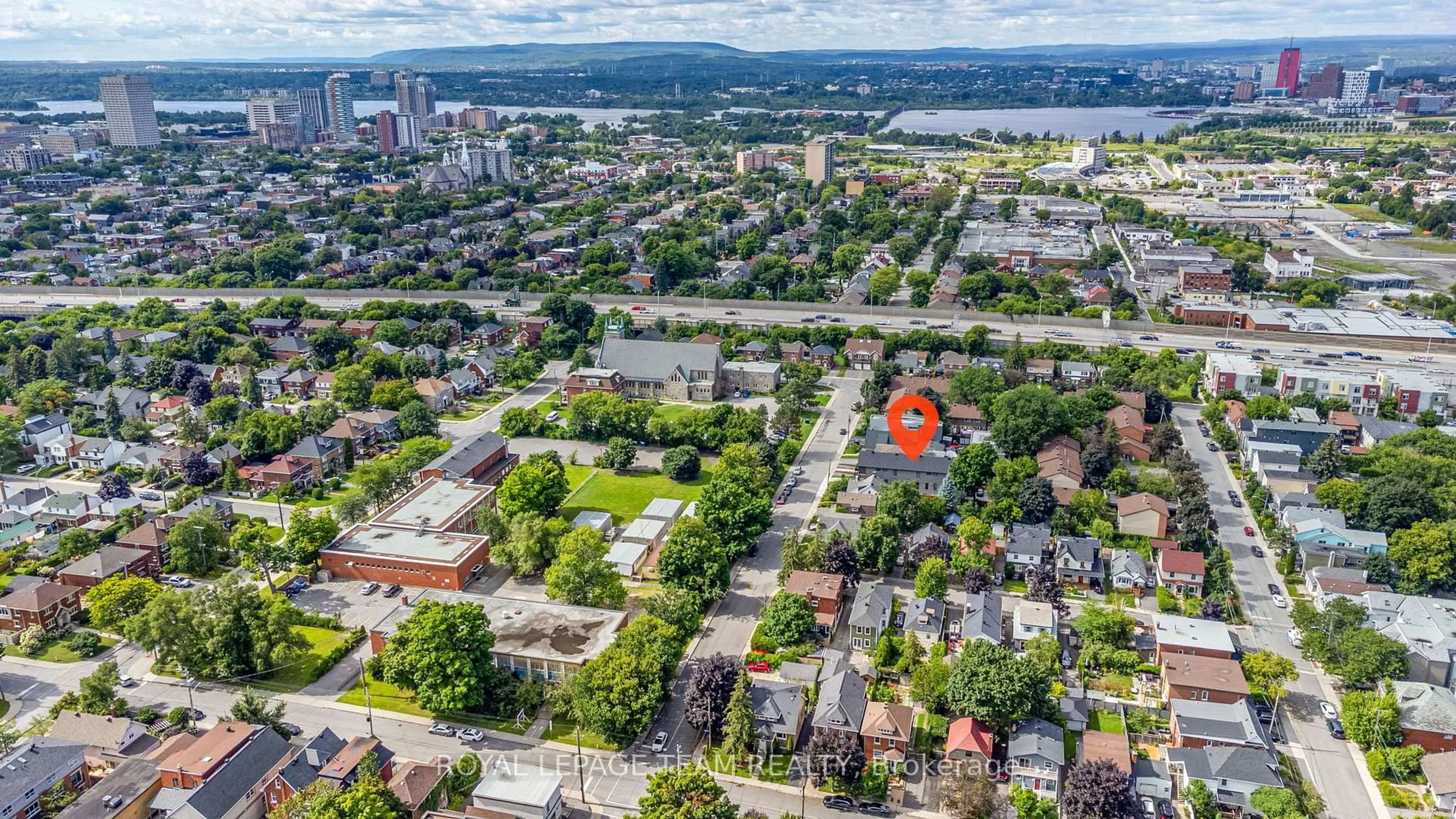 A pic from outside/outdoor area/front of a property/back of a property/a pic from drone, city buildings view from balcony for 241 Breezehill Ave #B/B2, Ottawa Ontario K1Y 2J2
