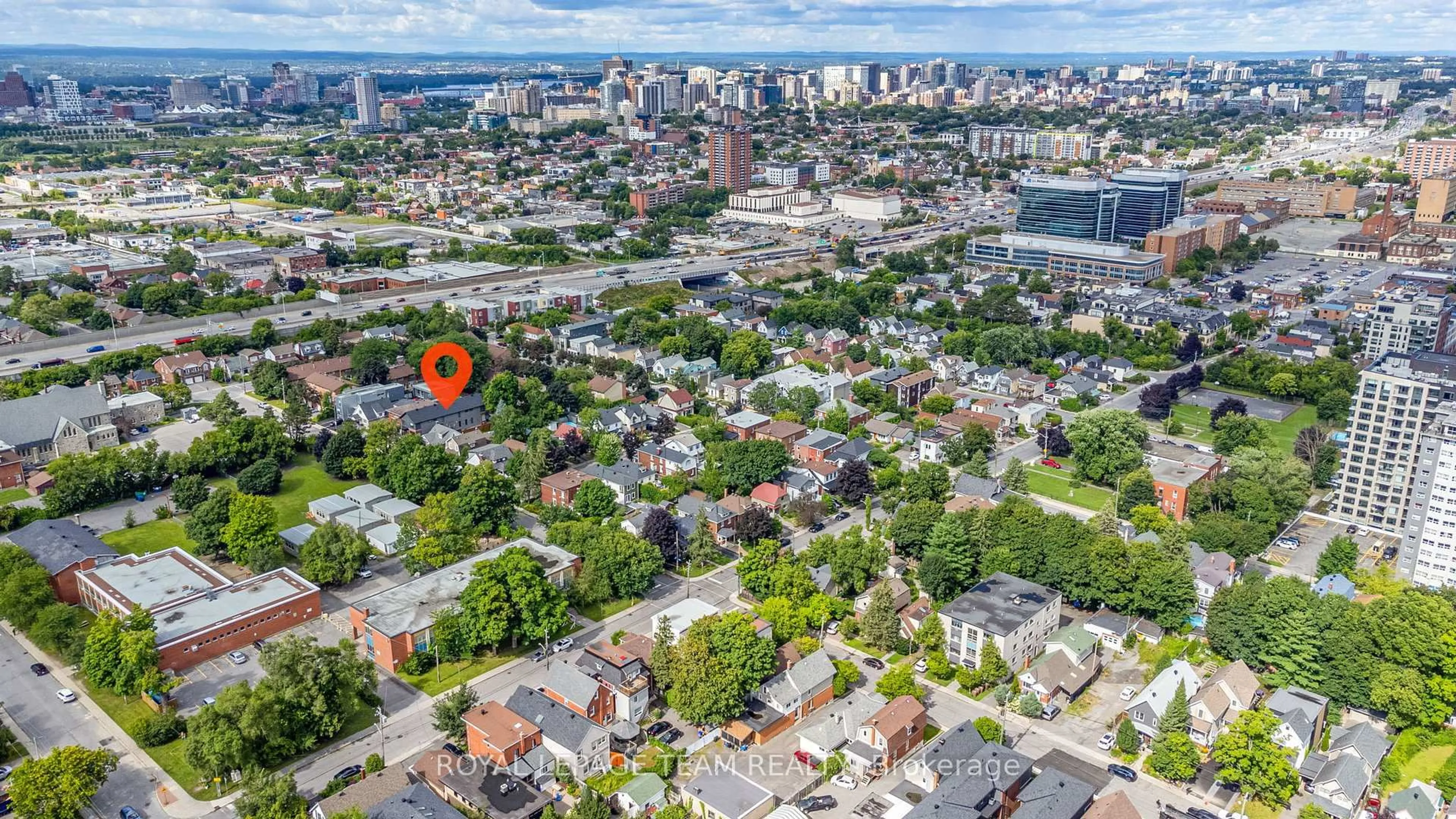 A pic from outside/outdoor area/front of a property/back of a property/a pic from drone, city buildings view from balcony for 241 Breezehill Ave #B/B2, Ottawa Ontario K1Y 2J2