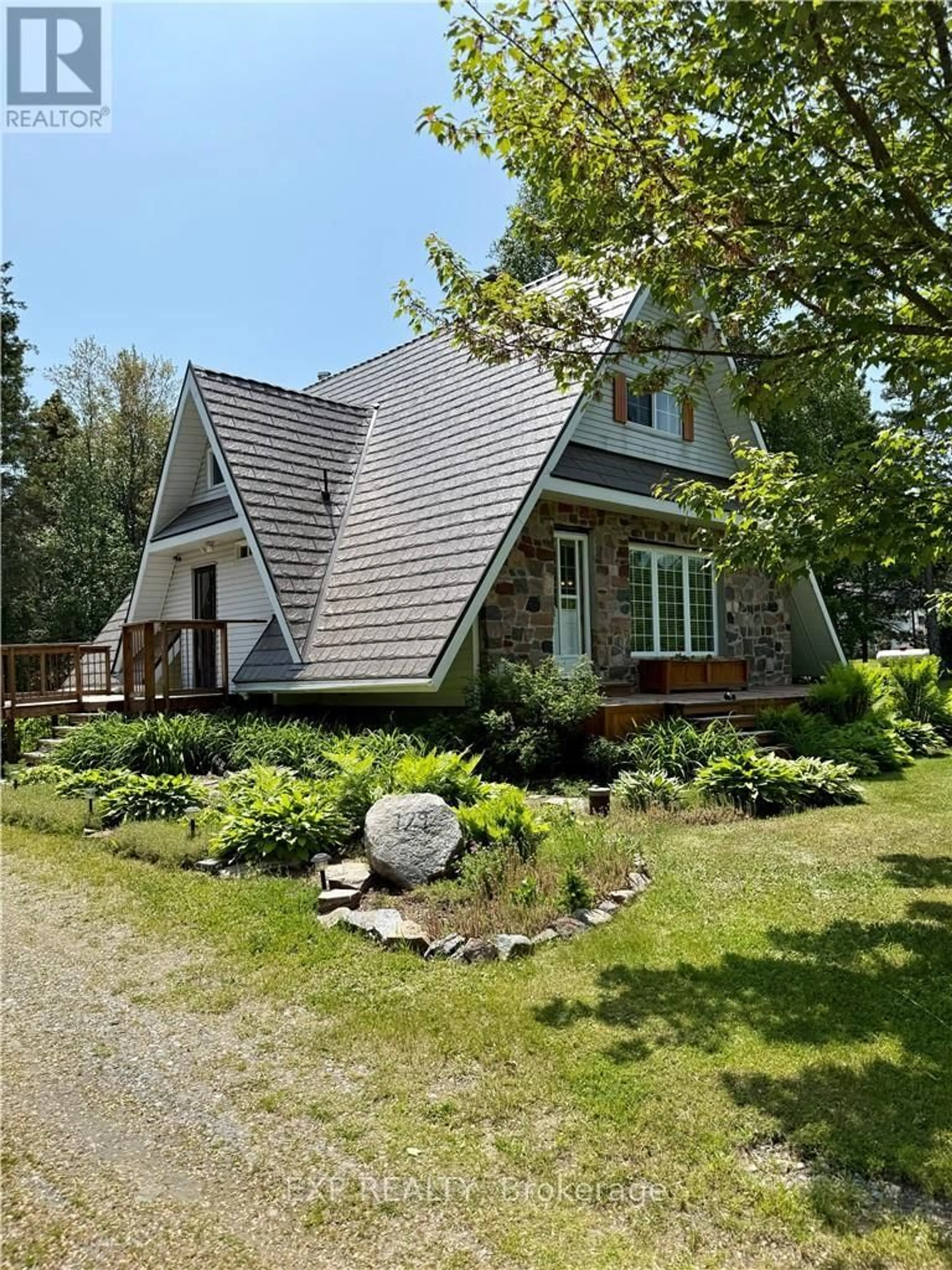 Home with vinyl exterior material, street for 129 Beauparlant Rd, St. Charles Ontario P0M 2W0