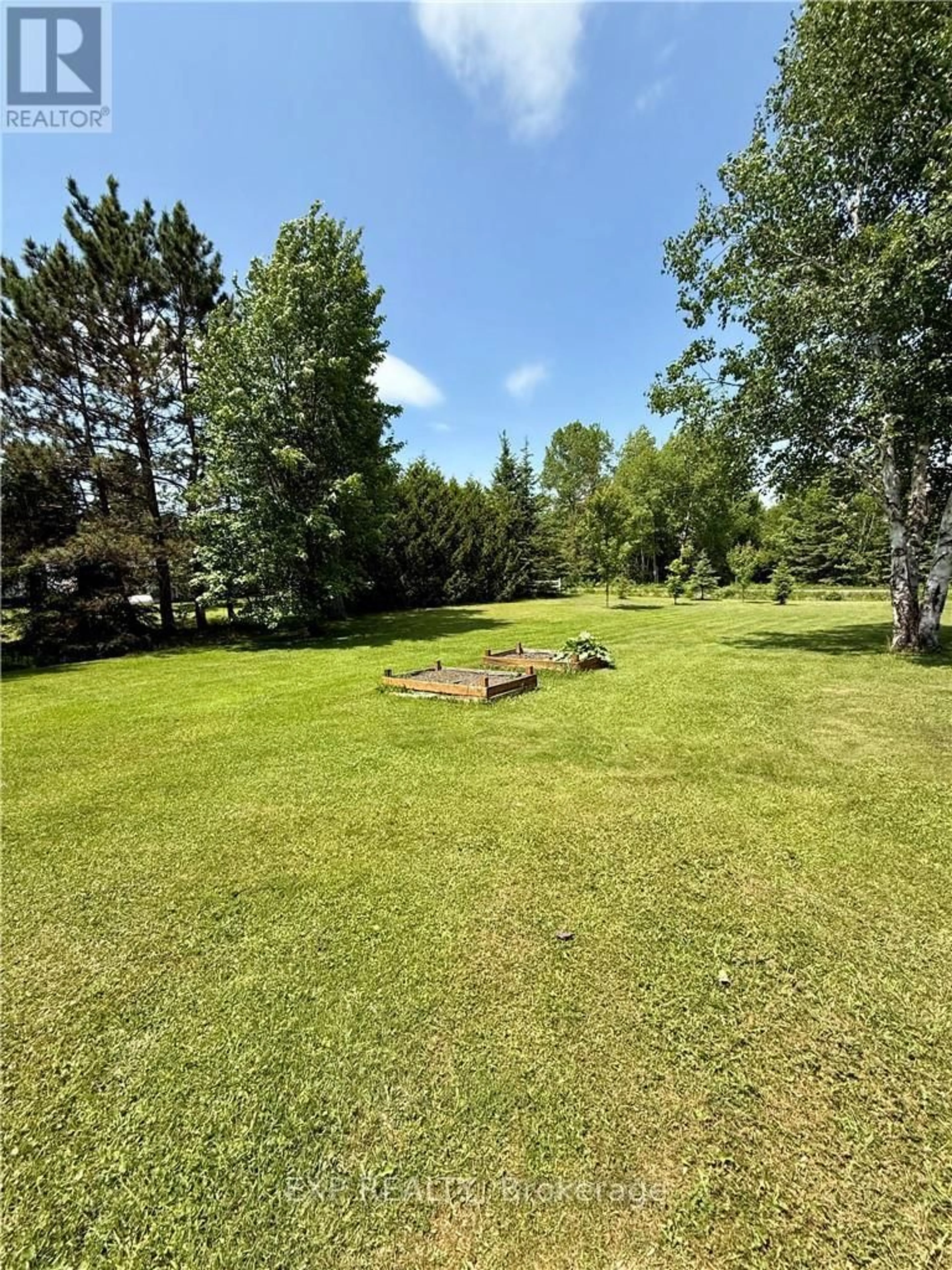 A pic from outside/outdoor area/front of a property/back of a property/a pic from drone, forest/trees view for 129 Beauparlant Rd, St. Charles Ontario P0M 2W0