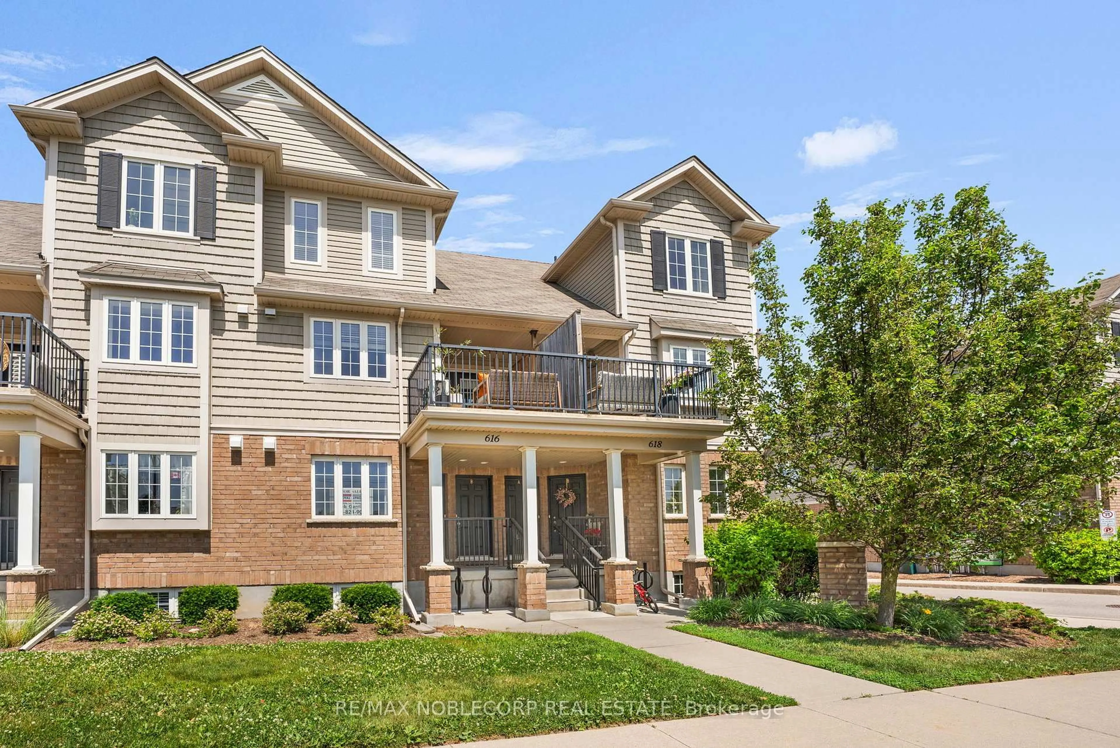 Home with brick exterior material, street for 616 Woodlawn Rd #B, Guelph Ontario N1E 0K4
