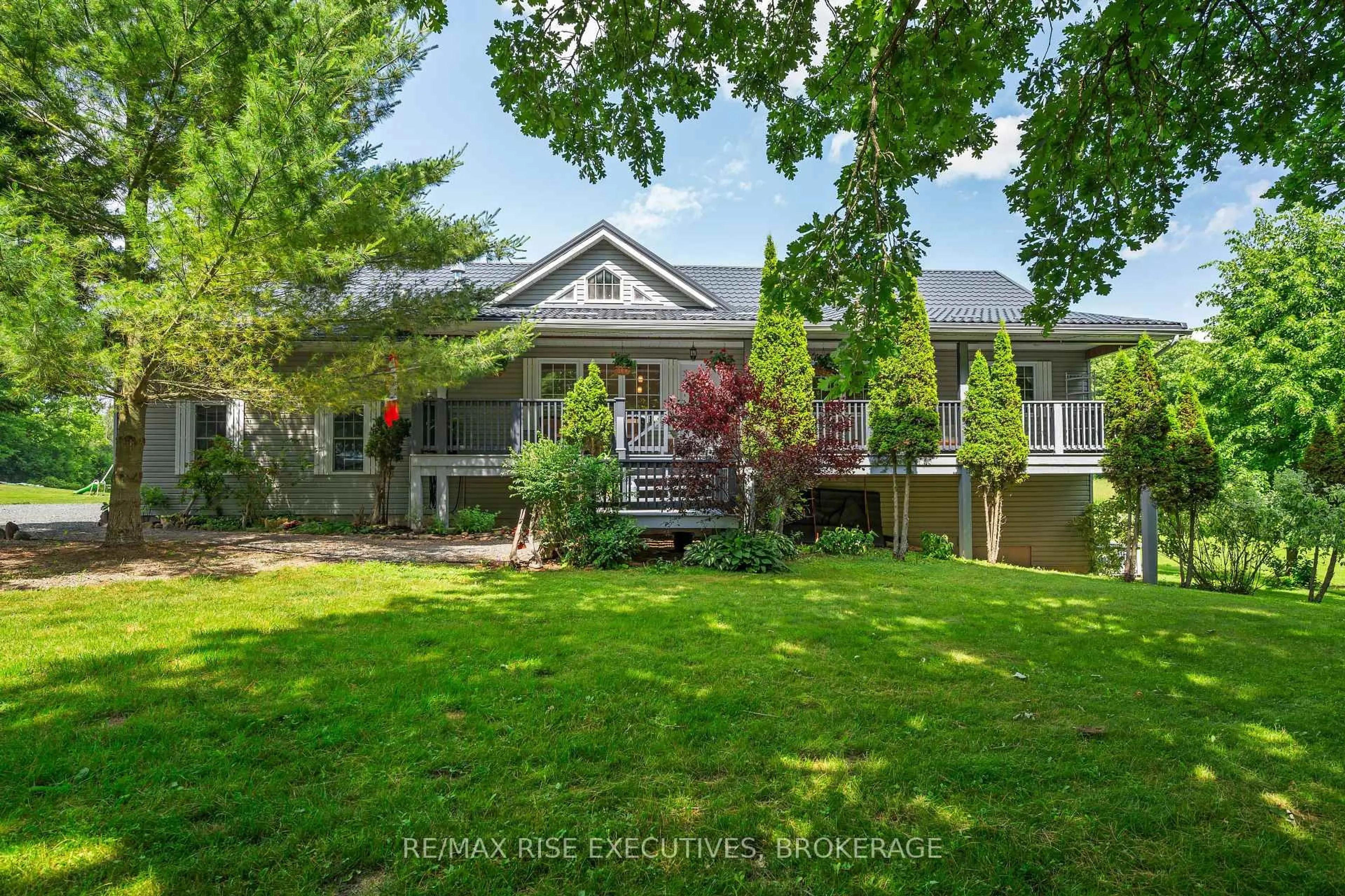 A pic from outside/outdoor area/front of a property/back of a property/a pic from drone, street for 63 Sunnyside Rd, Rideau Lakes Ontario K0G 1X0