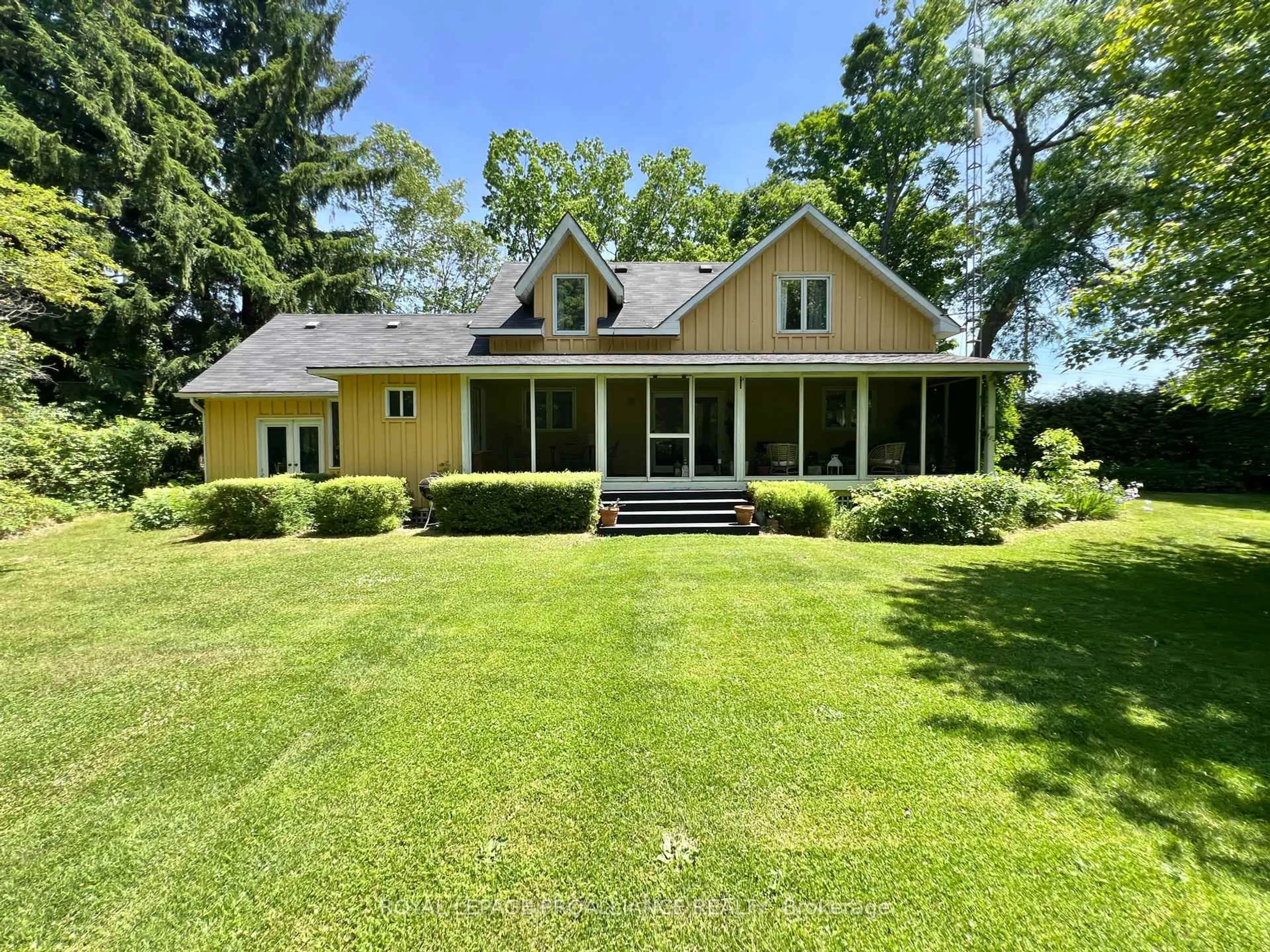 A pic from outside/outdoor area/front of a property/back of a property/a pic from drone, water/lake/river/ocean view for 352 County Road 10, Prince Edward County Ontario K0K 2T0