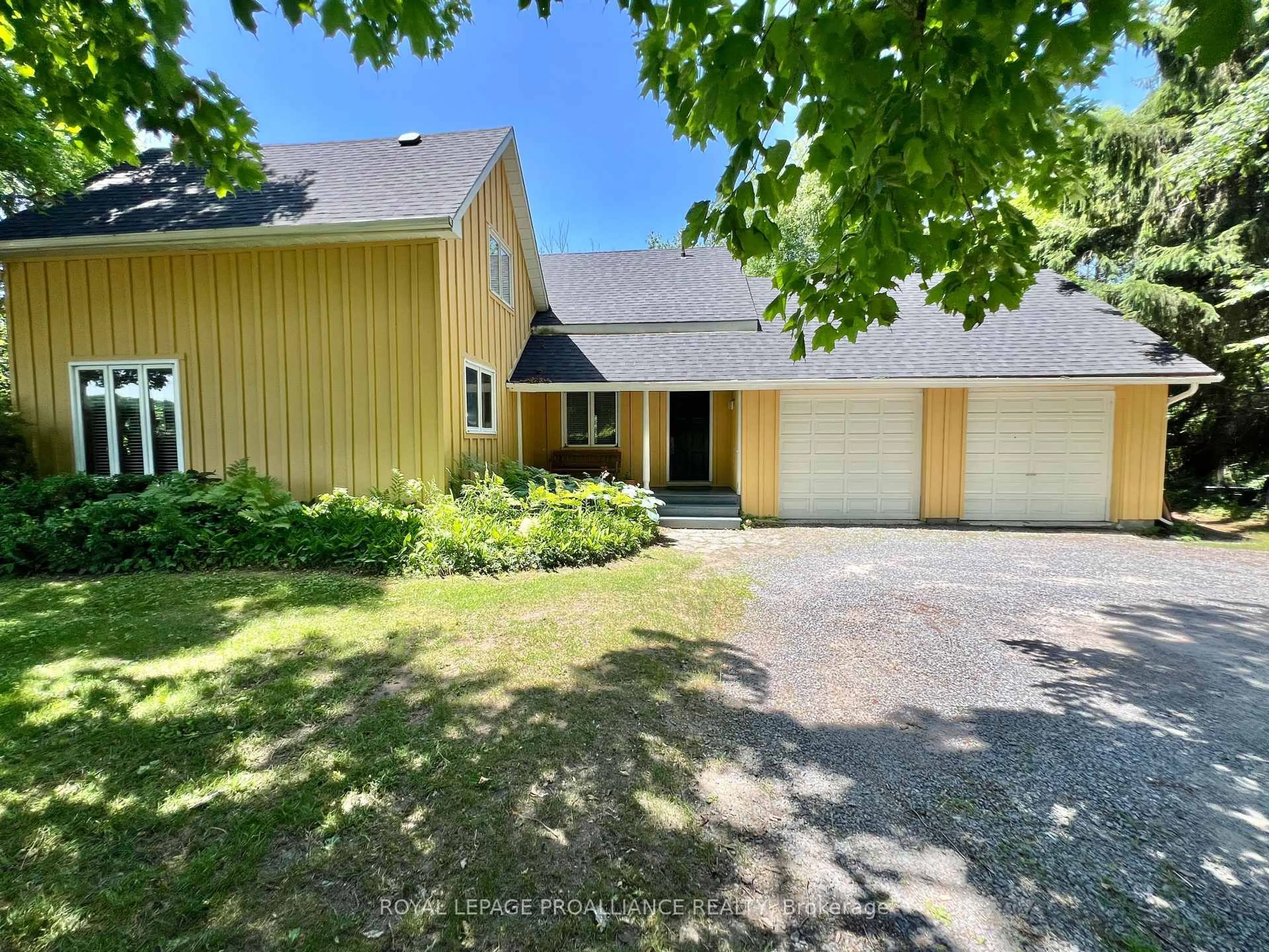 A pic from outside/outdoor area/front of a property/back of a property/a pic from drone, street for 352 County Road 10, Prince Edward County Ontario K0K 2T0