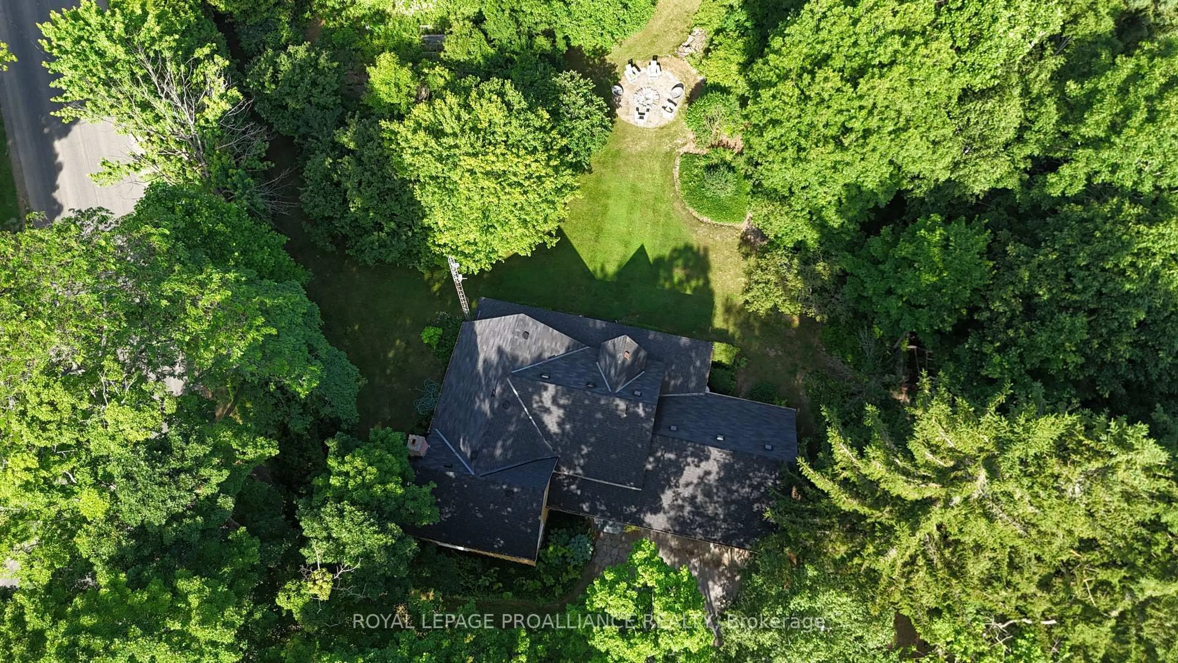 A pic from outside/outdoor area/front of a property/back of a property/a pic from drone, forest/trees view for 352 County Road 10, Prince Edward County Ontario K0K 2T0