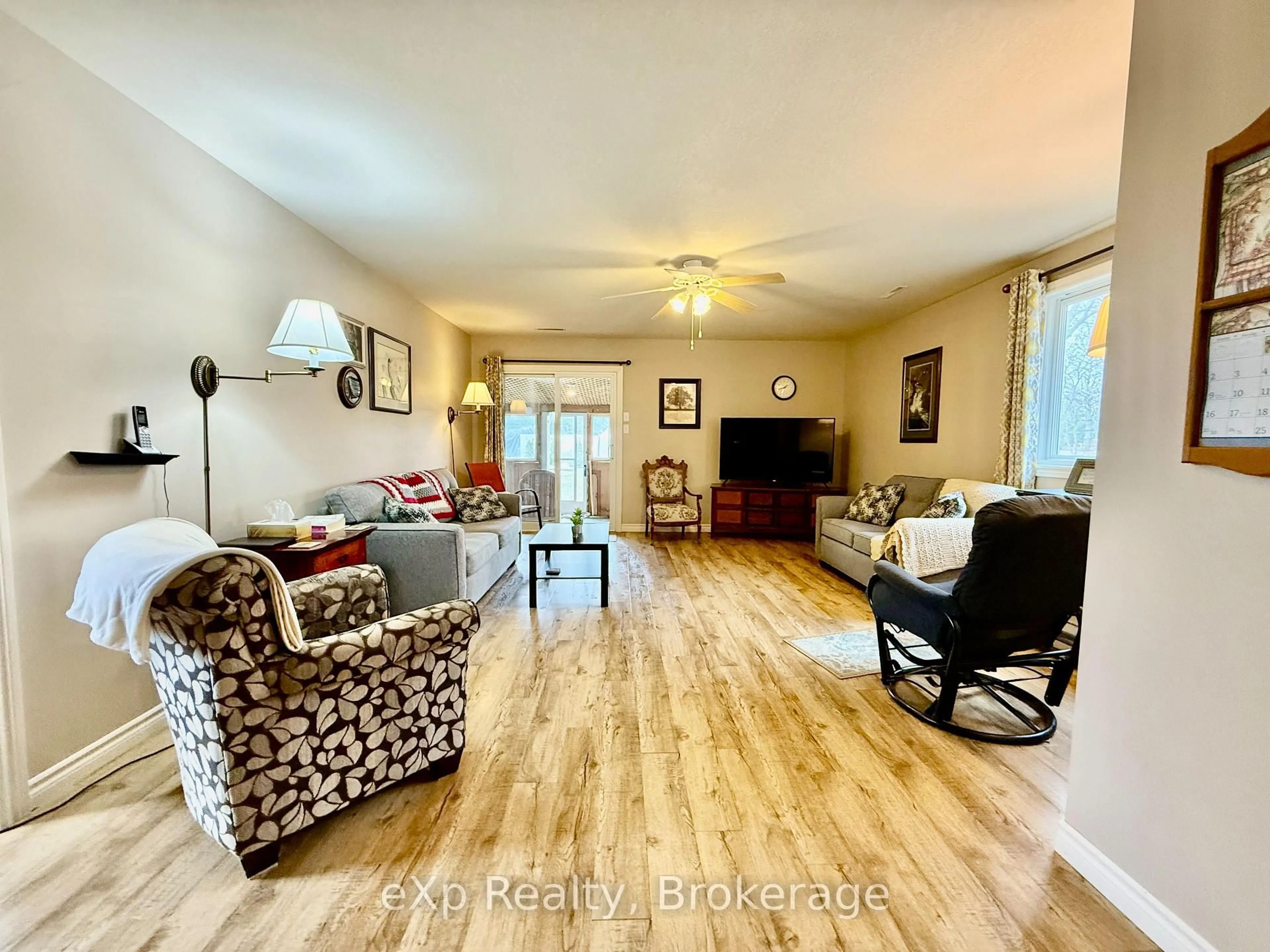 Living room with furniture, wood/laminate floor for 50 Absalom St, South Bruce Ontario N0G 2J0
