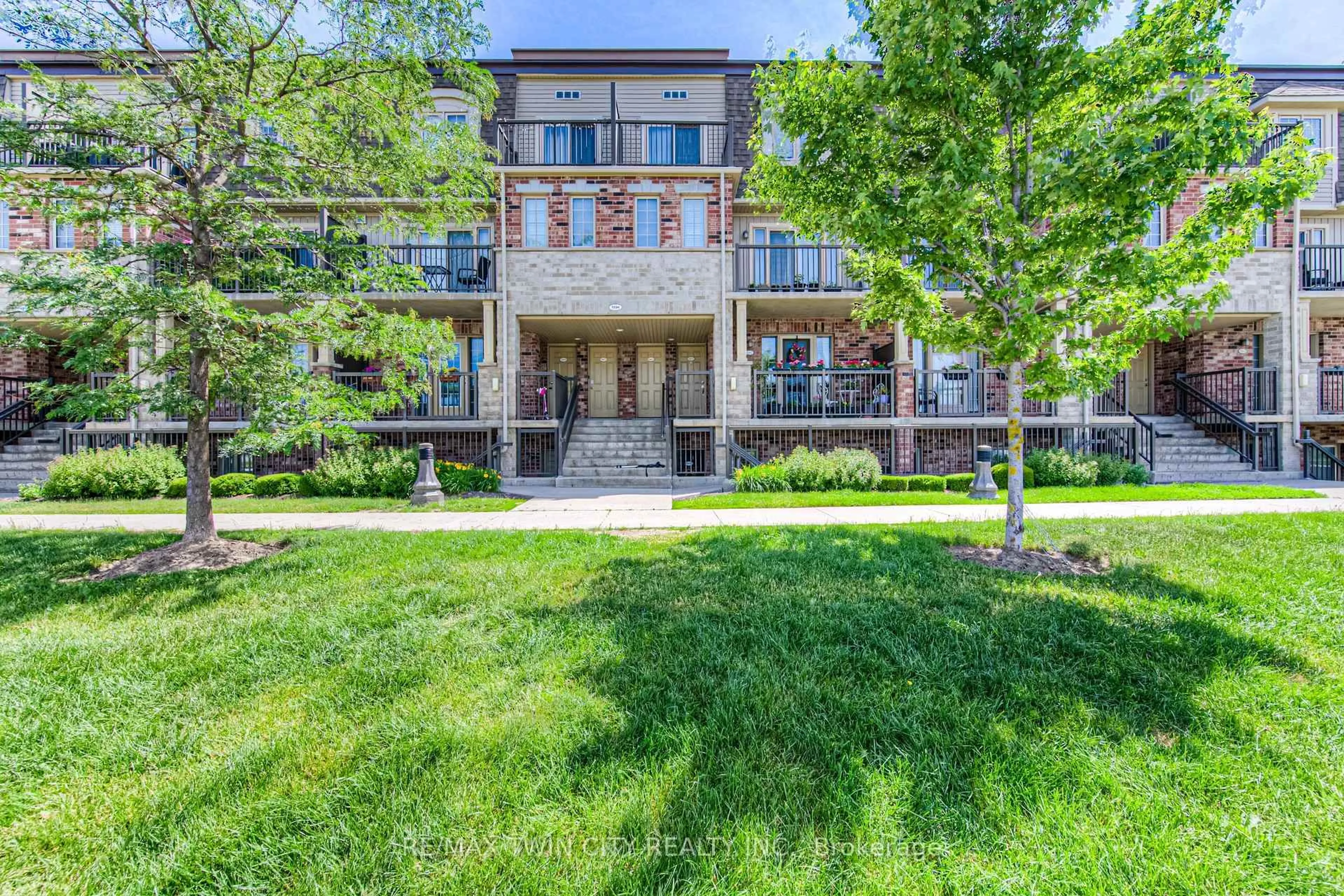 Home with brick exterior material, street for 1694 Fischer Hallman Rd #H, Kitchener Ontario N2R 0J1
