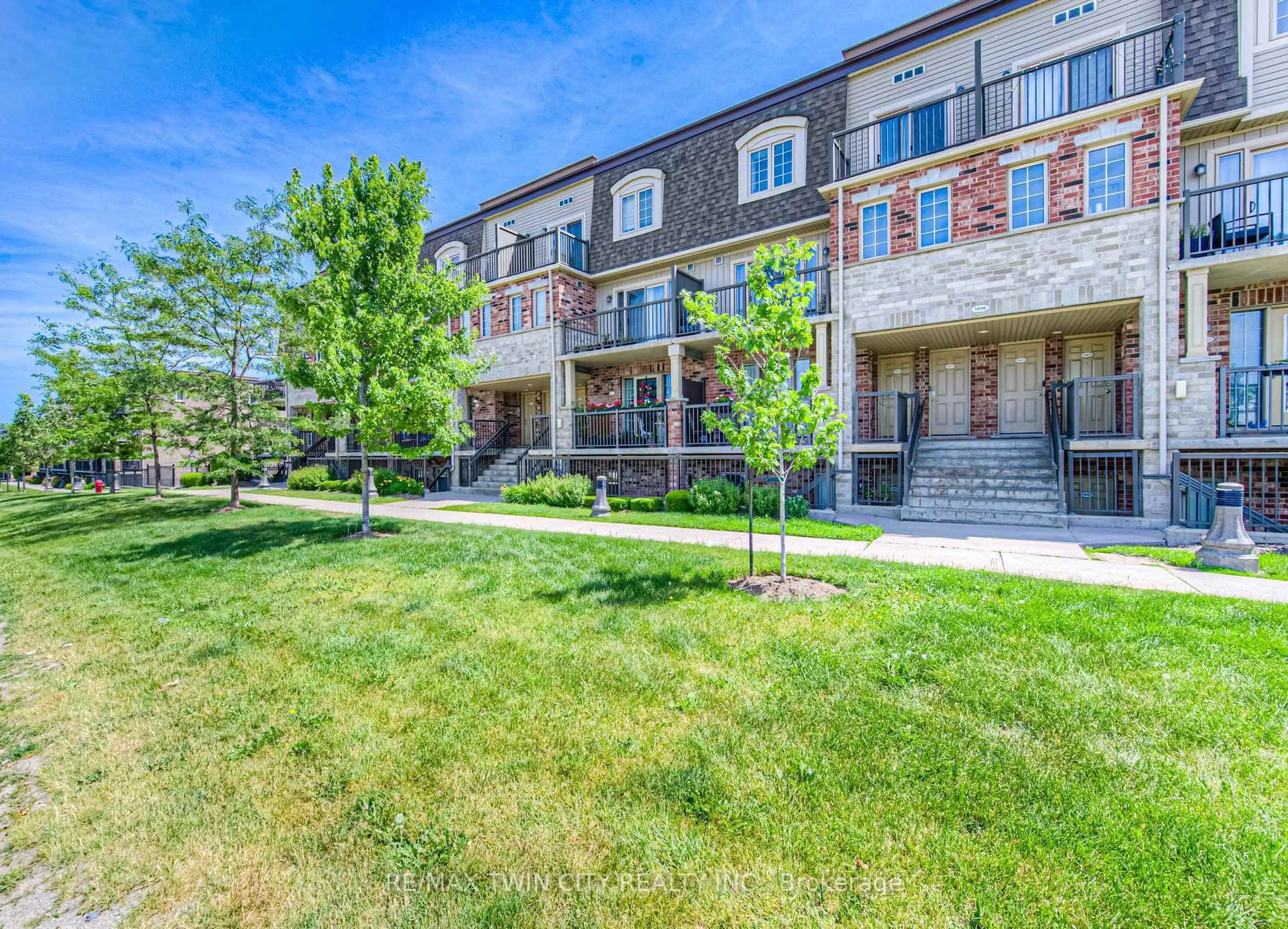 A pic from outside/outdoor area/front of a property/back of a property/a pic from drone, unknown for 1694 Fischer Hallman Rd #H, Kitchener Ontario N2R 0J1