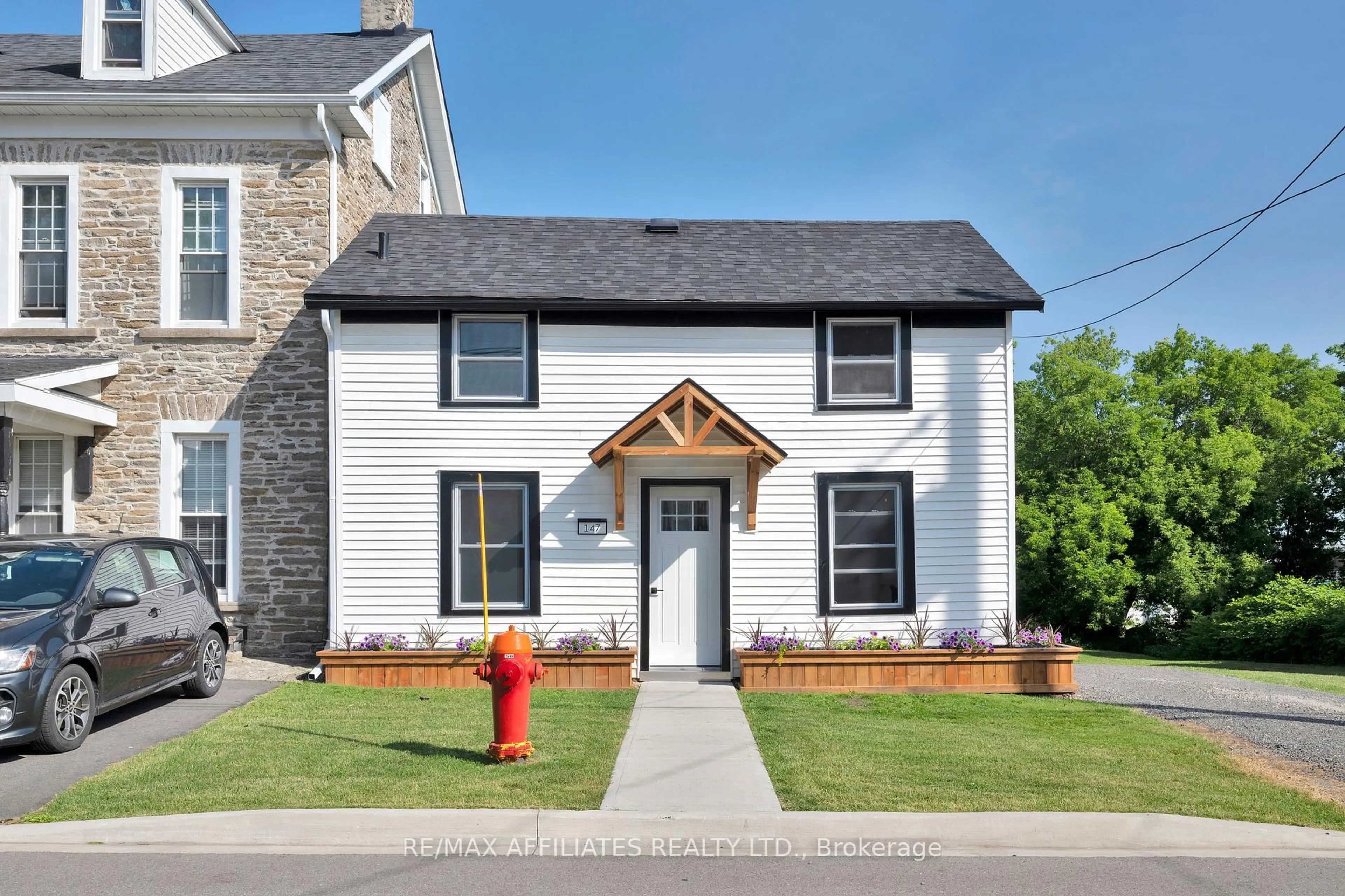 Home with brick exterior material, street for 147 Dibble St, Prescott Ontario K0E 1T0