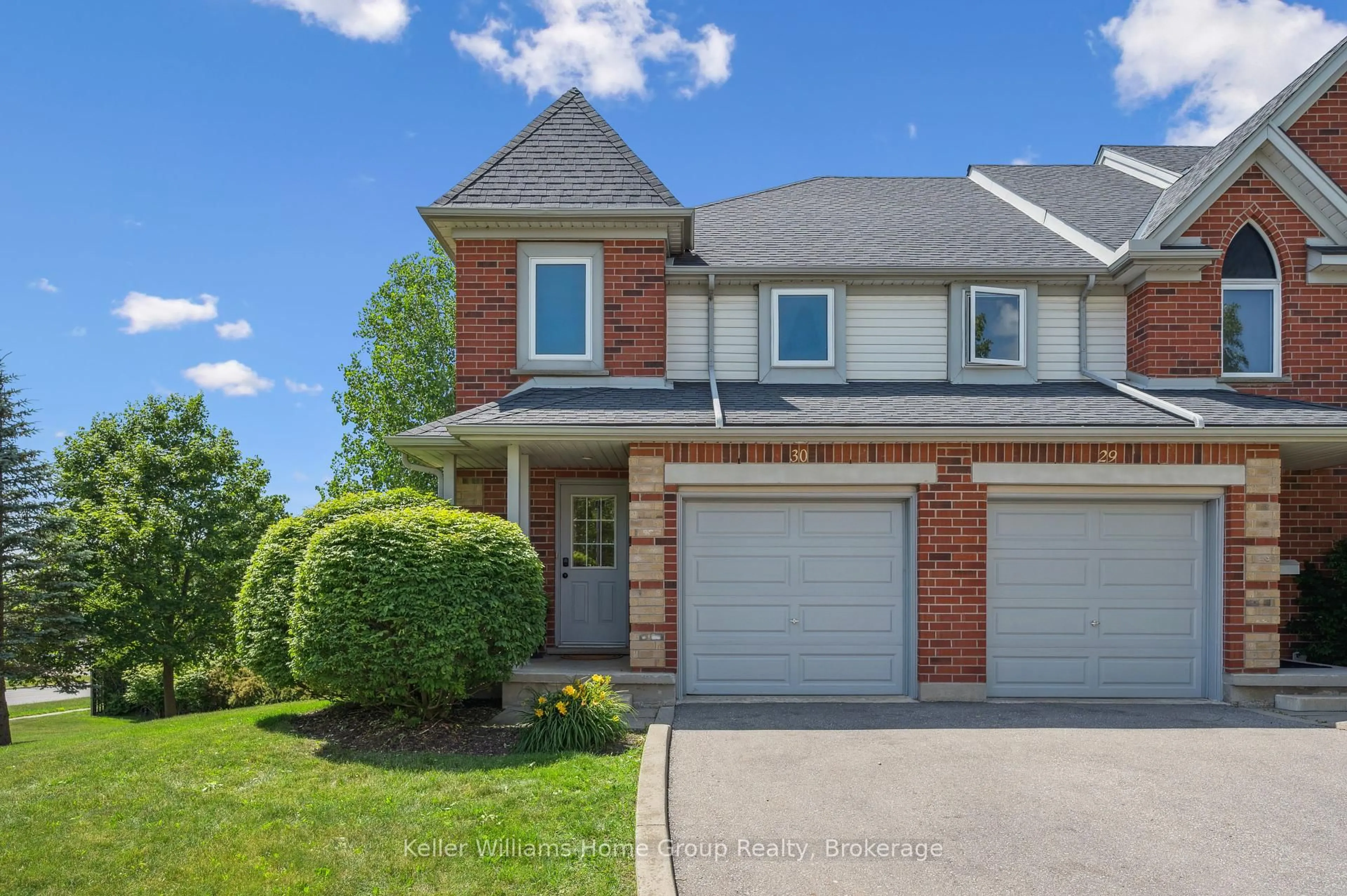Home with brick exterior material, street for 920 Edinburgh Rd #30, Guelph Ontario N1G 5C6