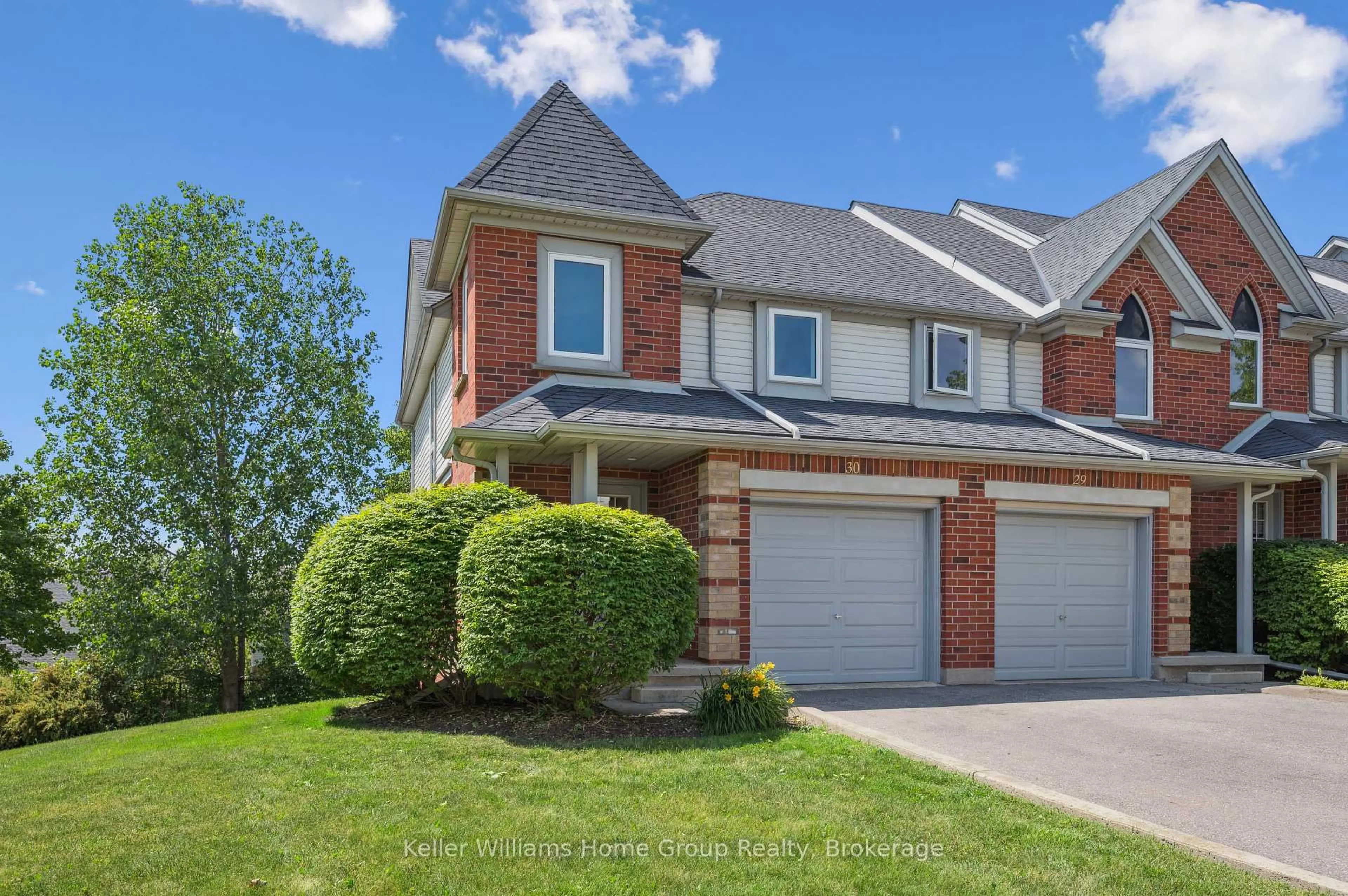 Home with brick exterior material, street for 920 Edinburgh Rd #30, Guelph Ontario N1G 5C6