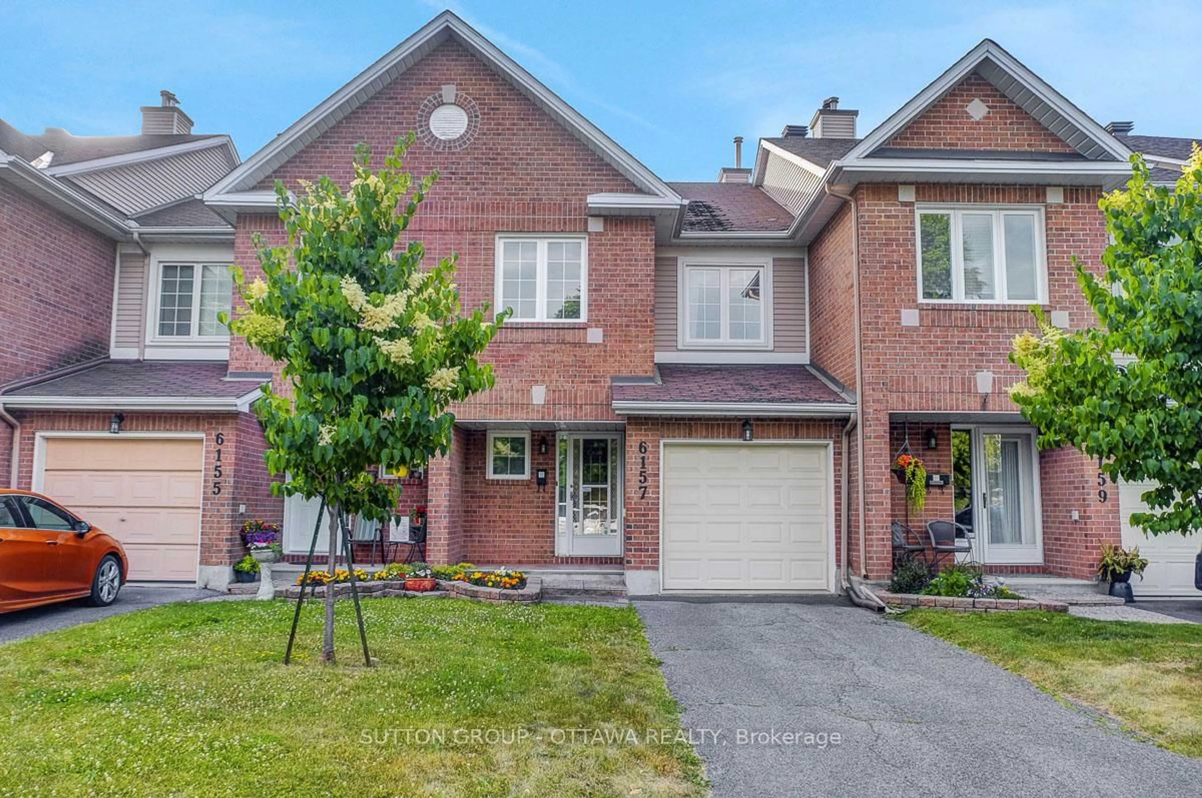 Home with brick exterior material, street for 6157 Oak Meadows Dr #19, Ottawa Ontario K1C 7G7