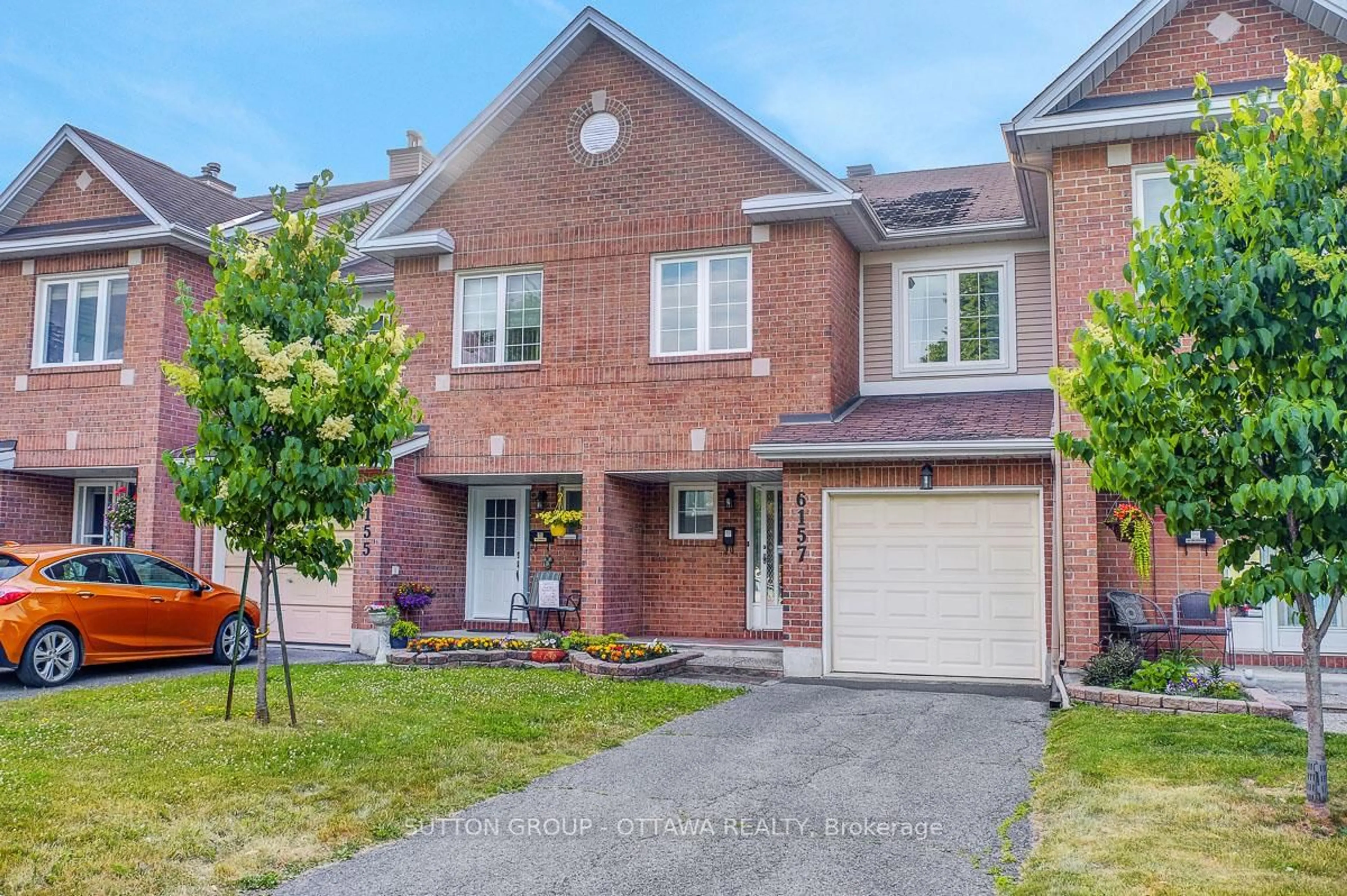 Home with brick exterior material, street for 6157 Oak Meadows Dr #19, Ottawa Ontario K1C 7G7
