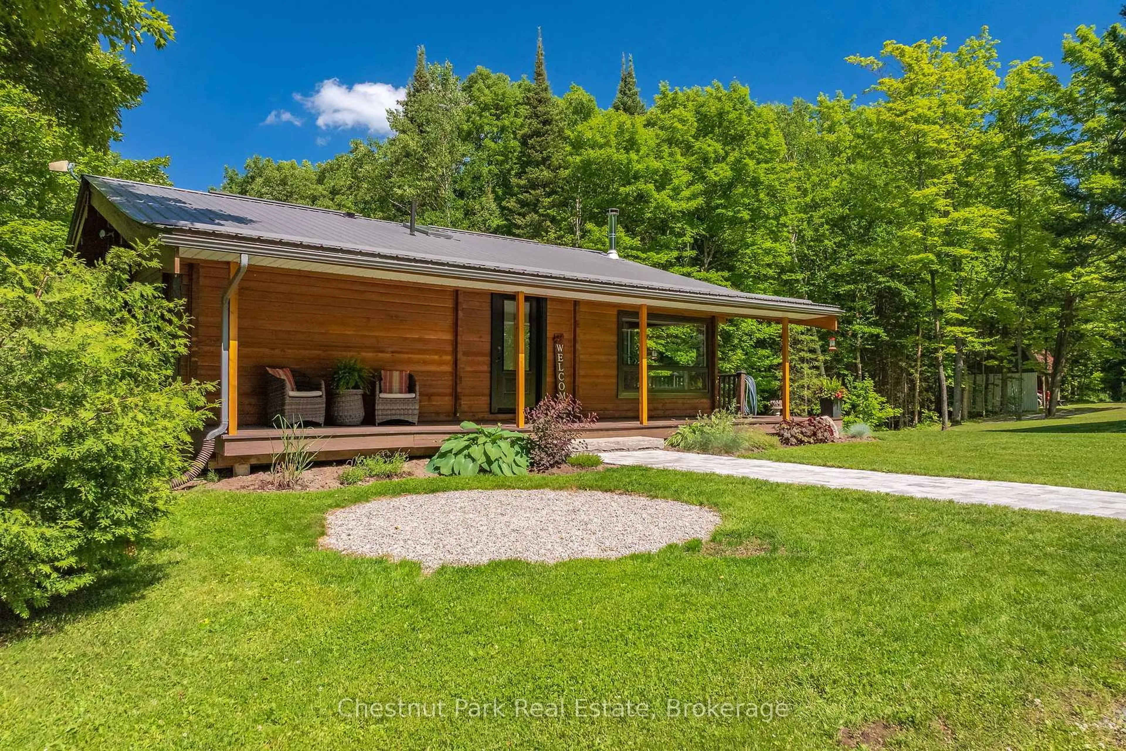 A pic from outside/outdoor area/front of a property/back of a property/a pic from drone, unknown for 487 O'connor Line Rd, Powassan Ontario P0H 1Z0